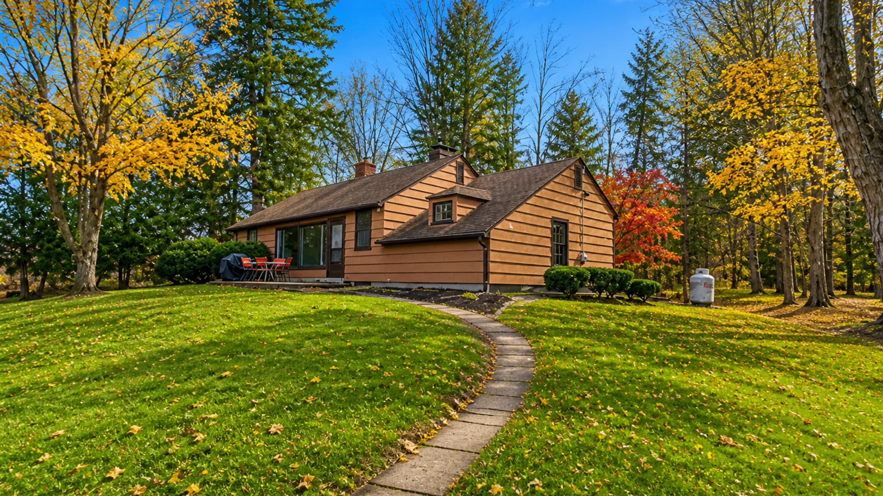 Second home exterior with spacious lawn