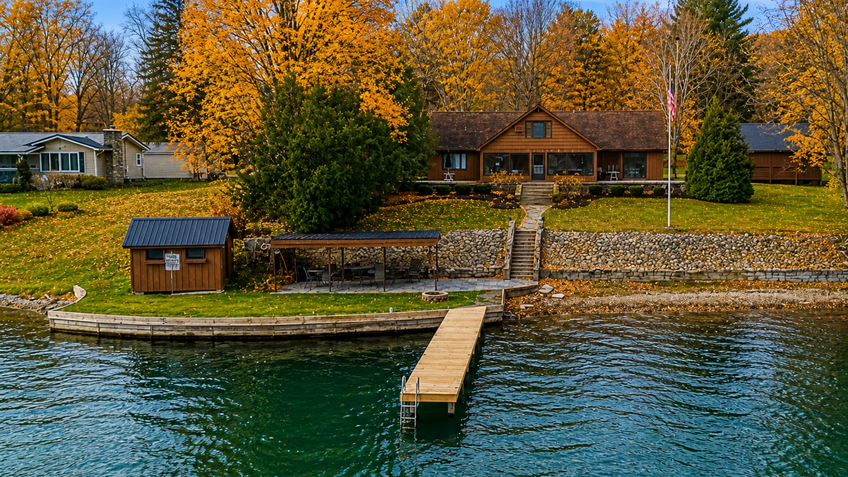 Main house and shoreline viewed beyond the dock