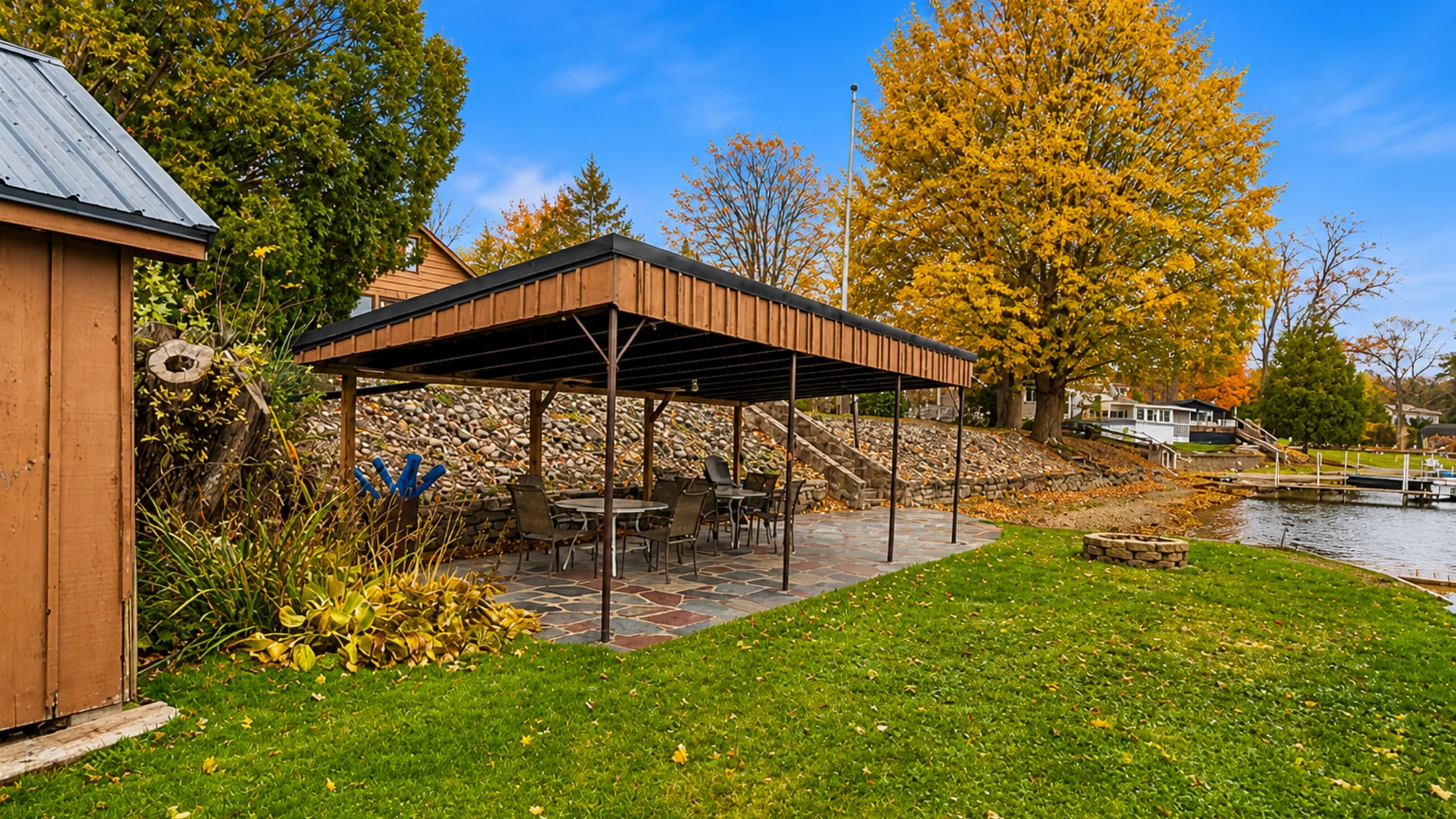 Covered outdoor dining area near the shoreline