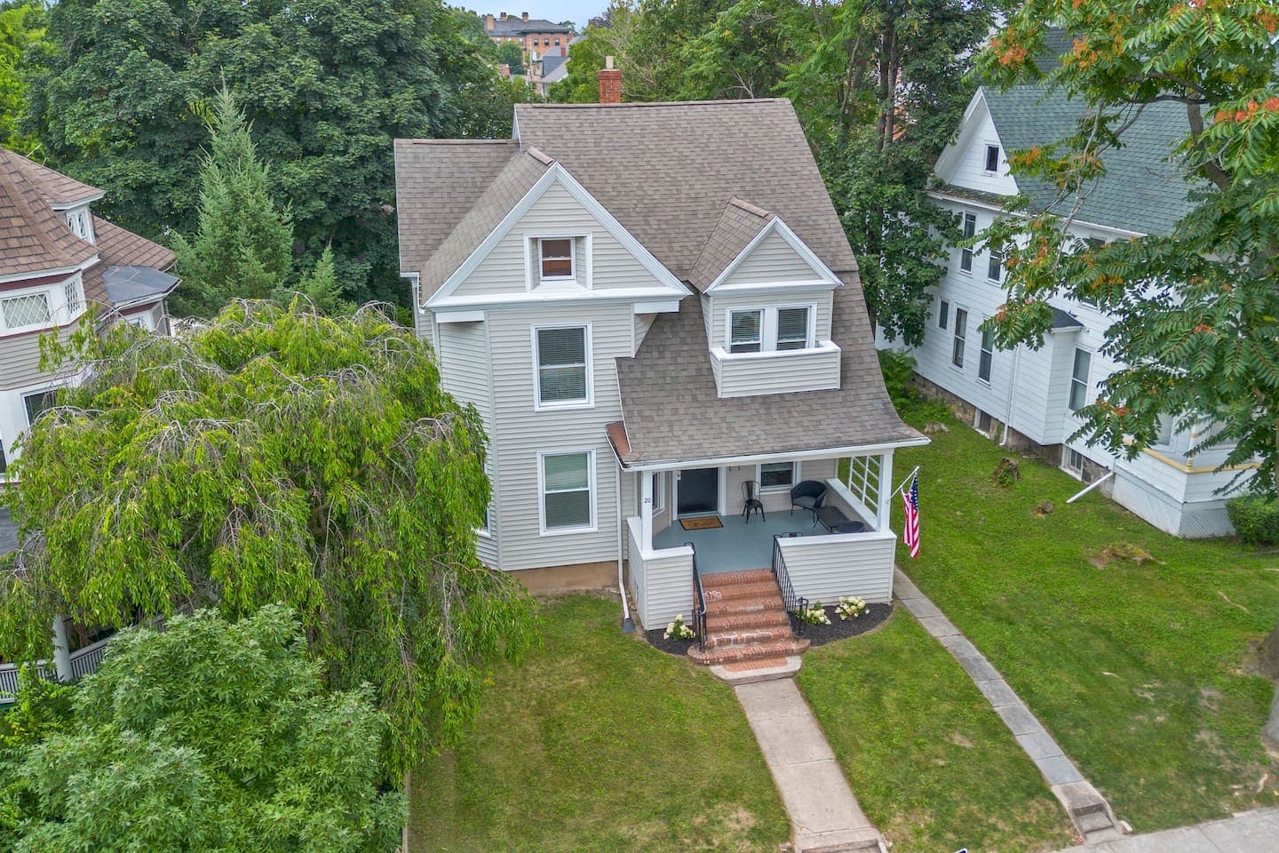 Aerial view of the home and backyard