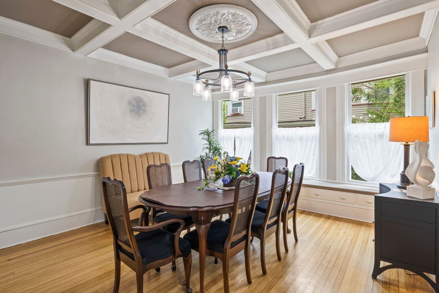 Formal dining room with coffered ceiling