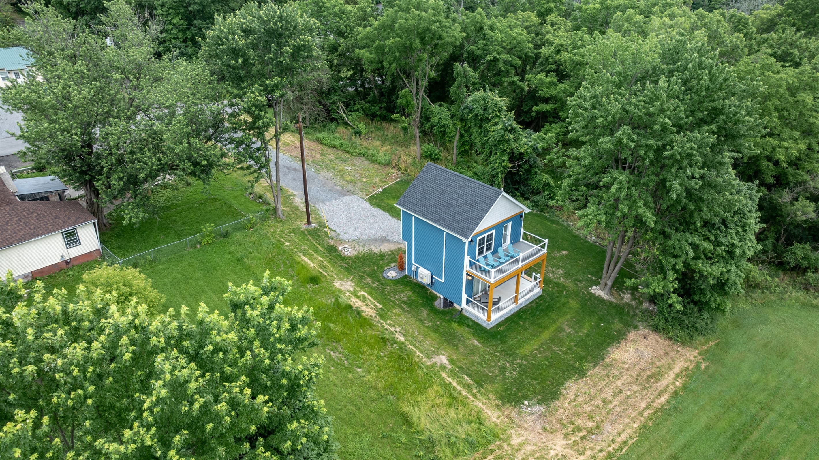 Aerial view of the property and driveway