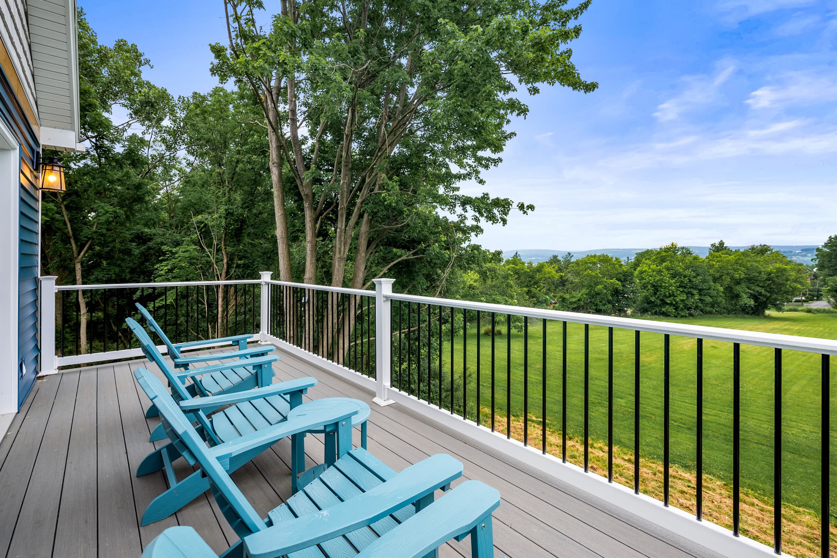 Upper deck with Adirondack chairs