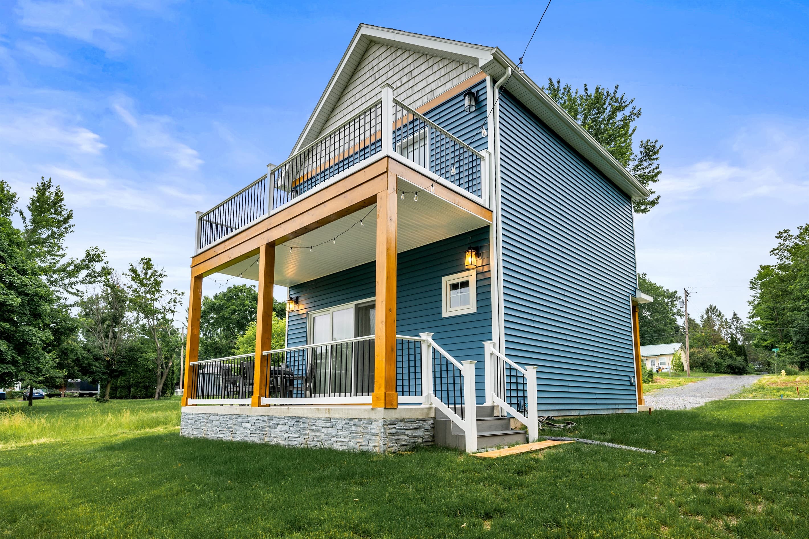 Blue exterior with upper balcony