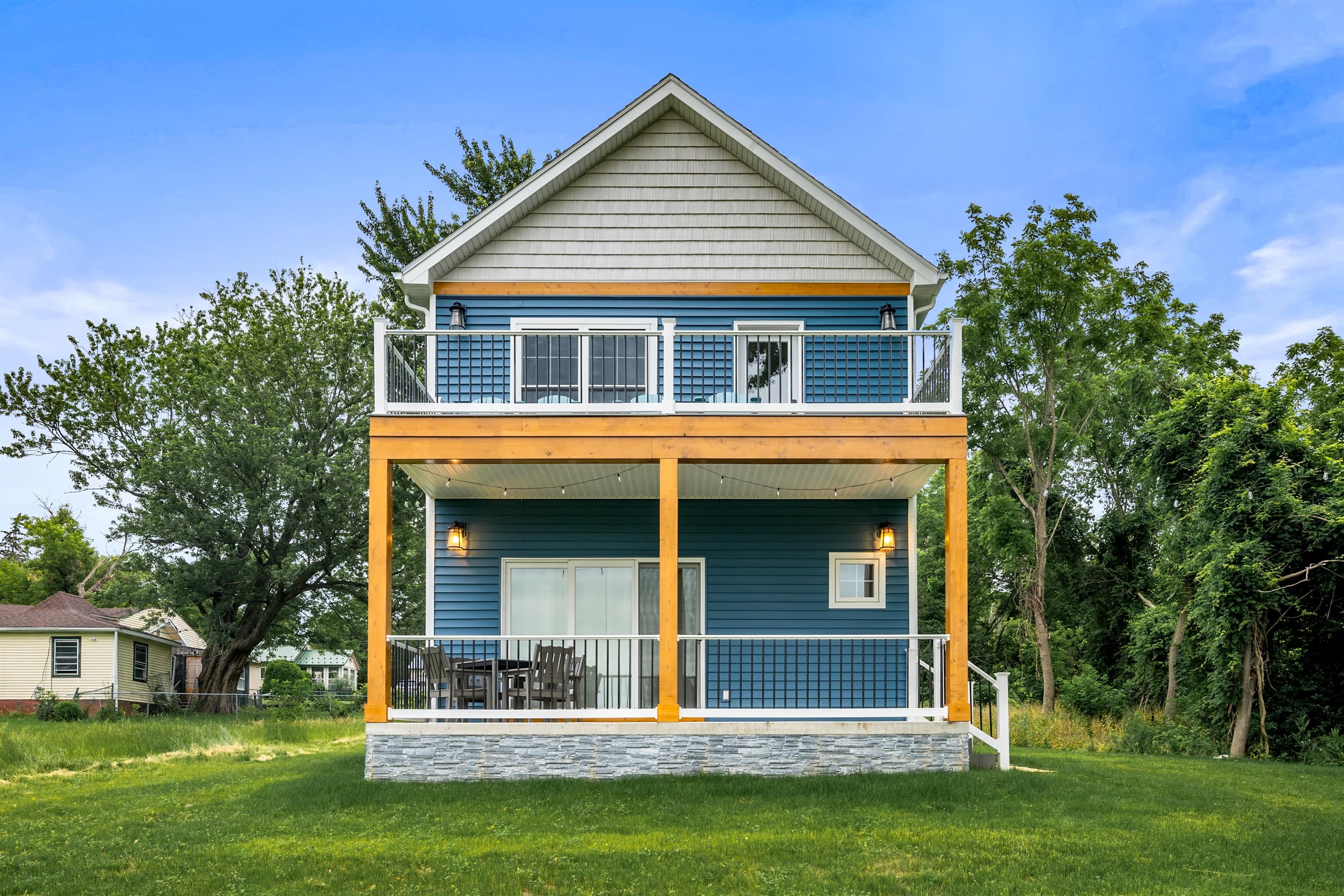 Rear exterior with covered lower porch