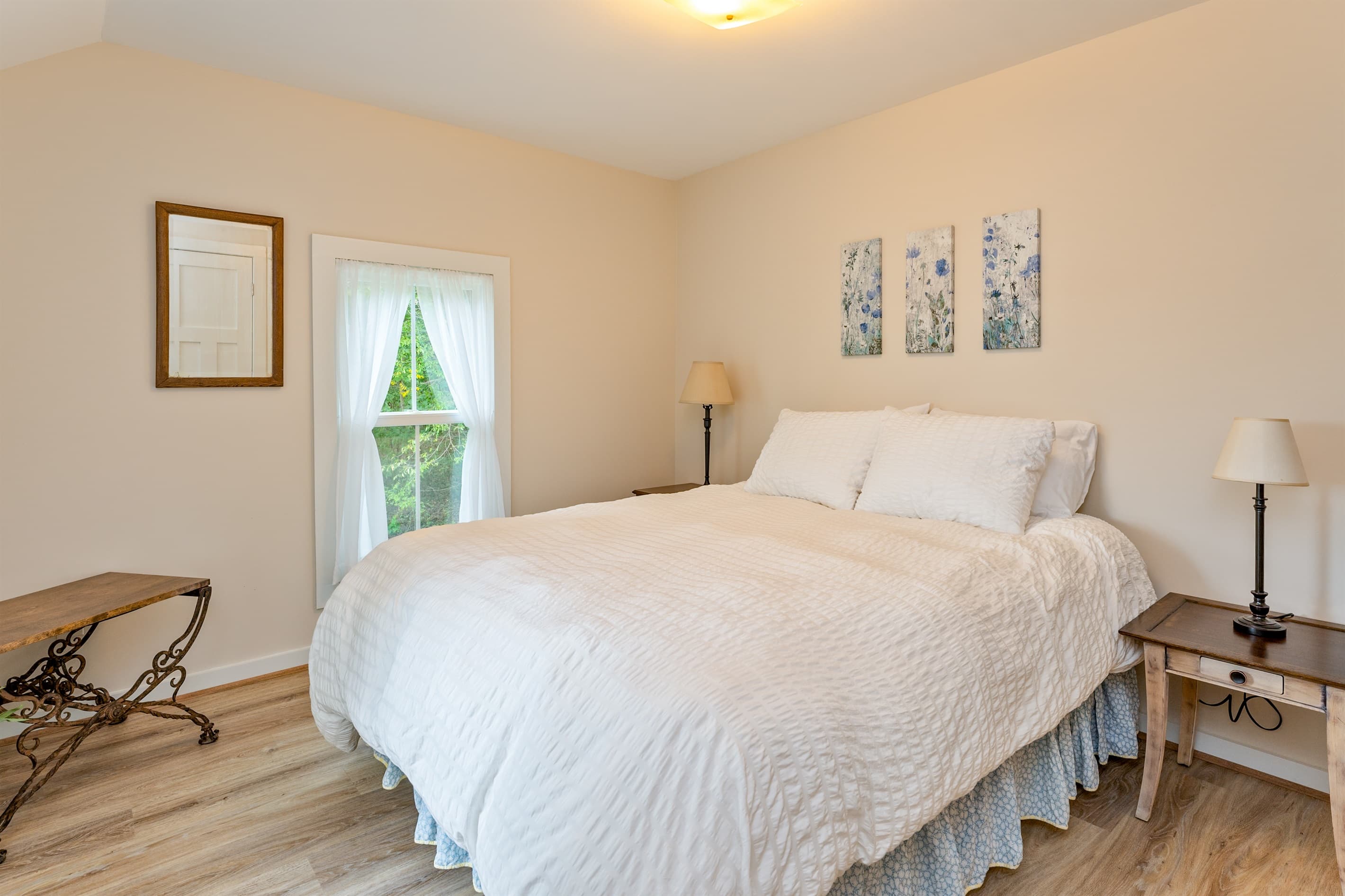Bedroom with soft neutral bedding
