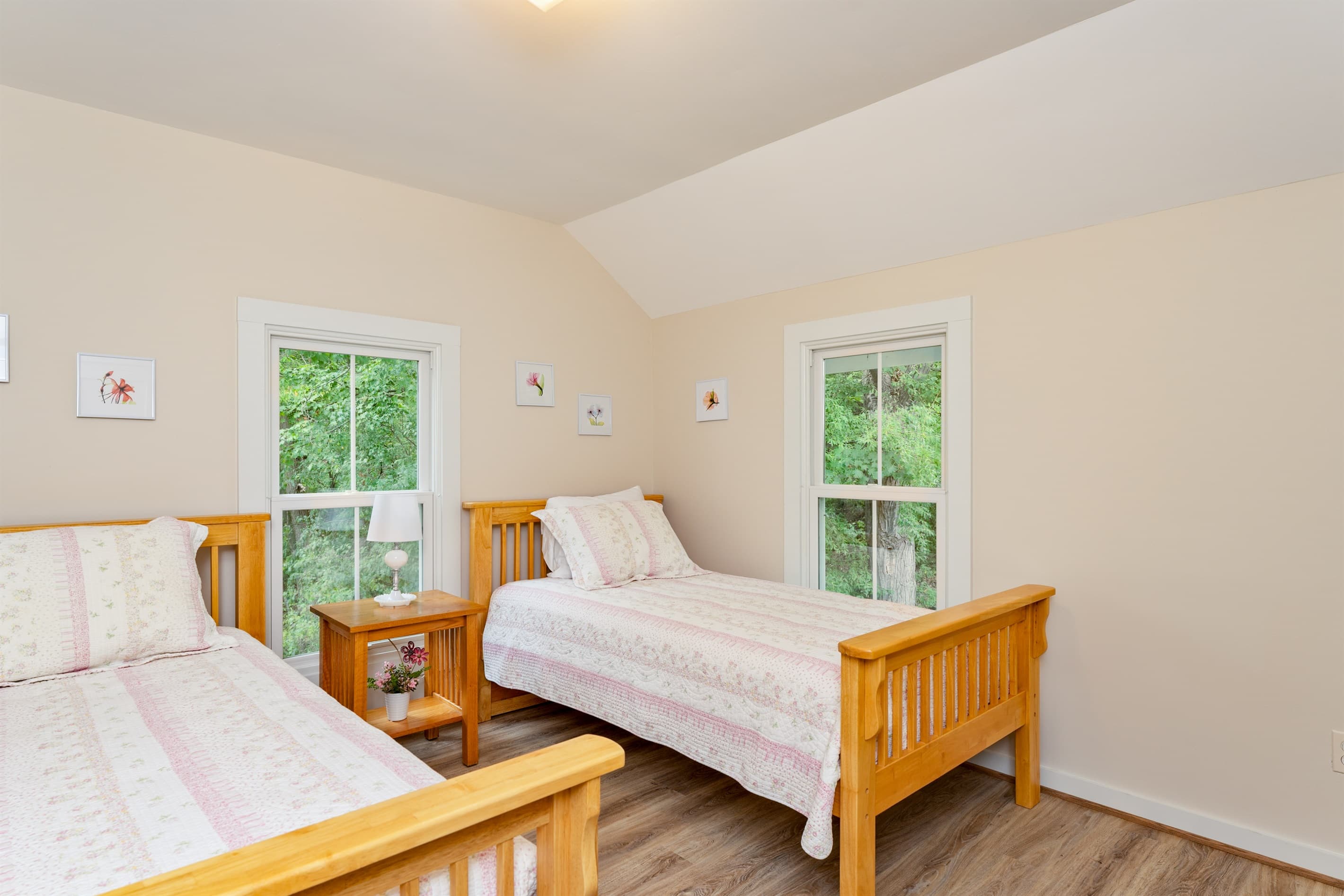 Twin bedroom with wood furnishings