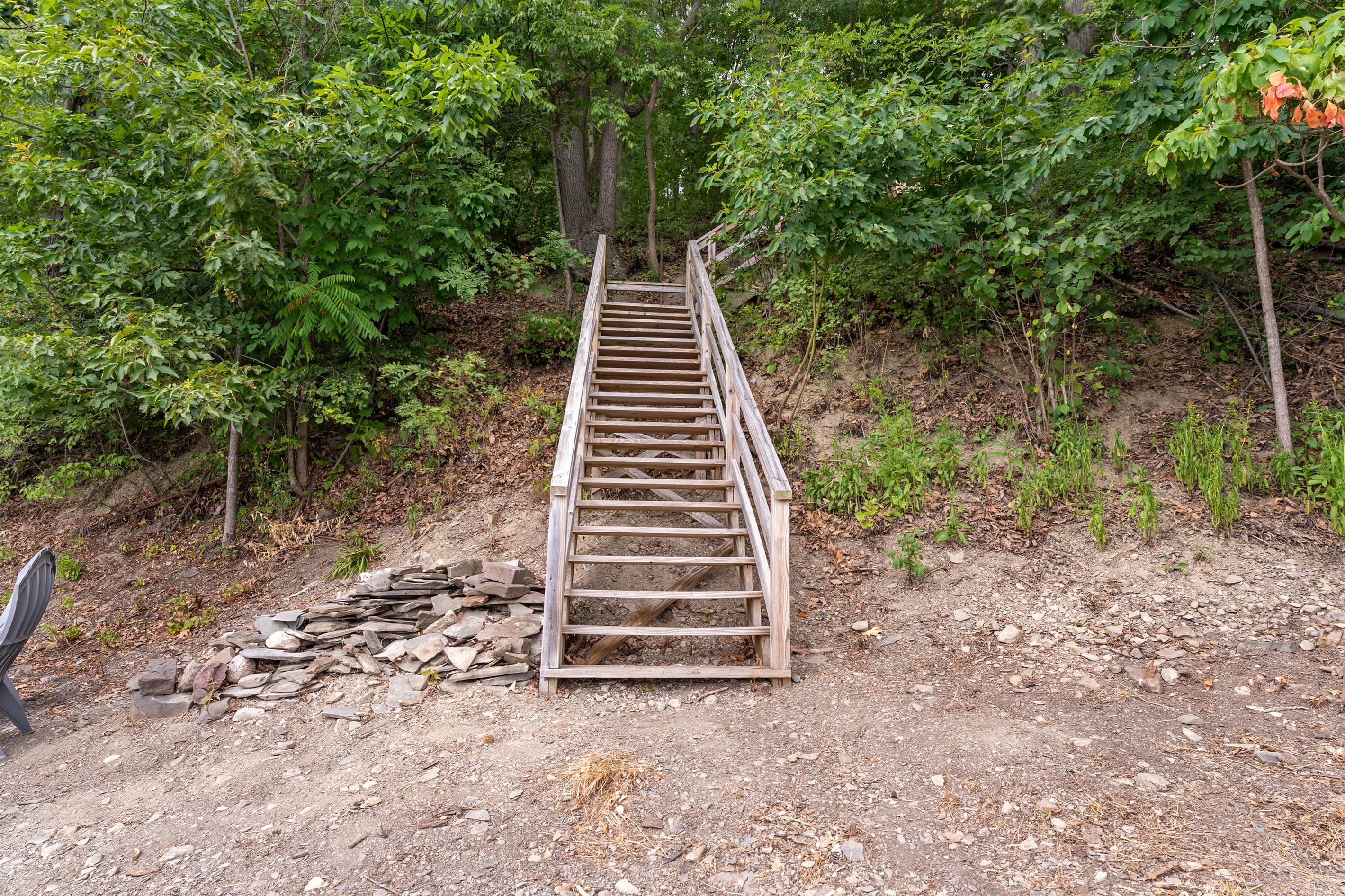 Wooden staircase leading to the property 