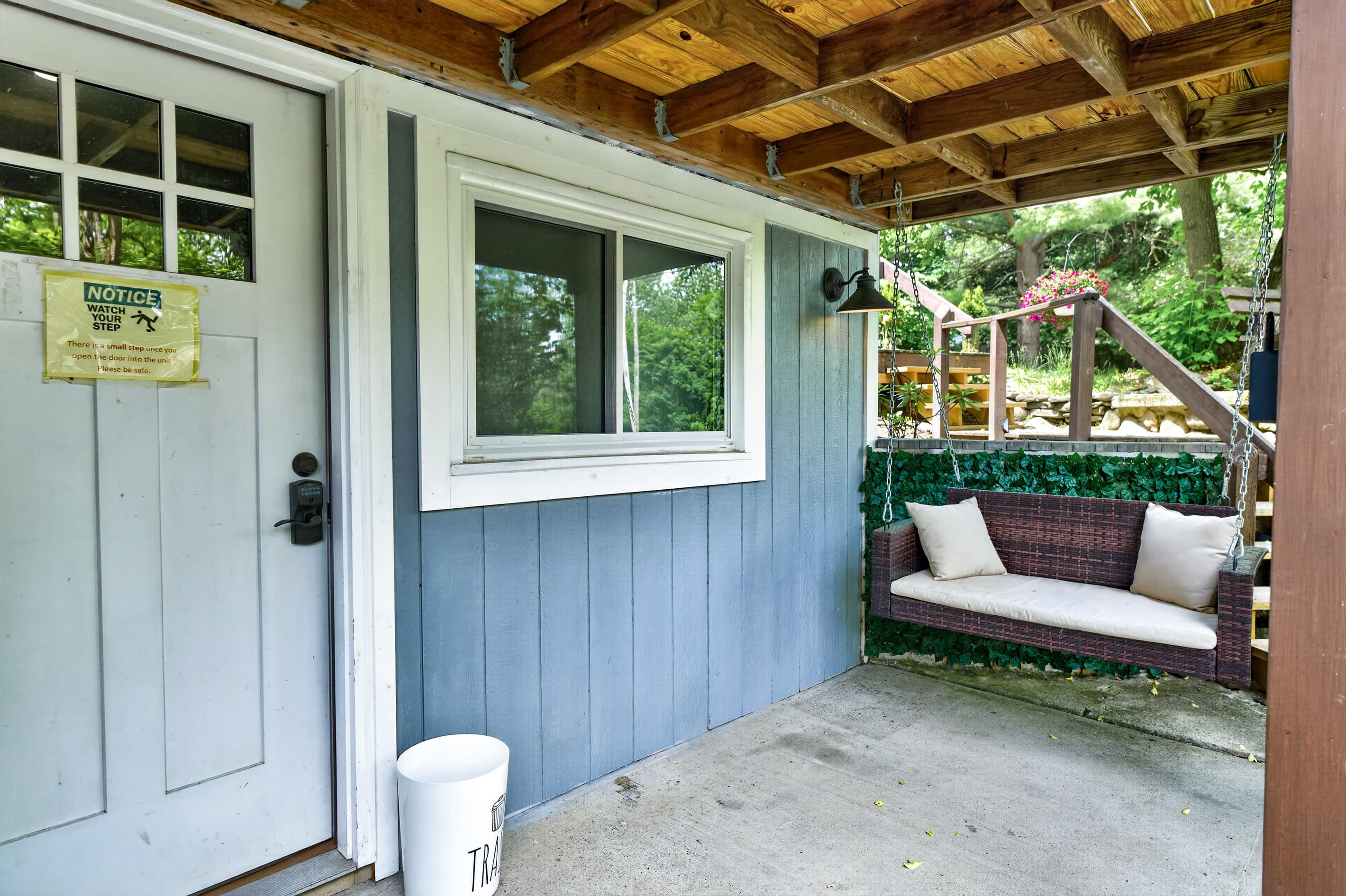 Covered entry porch with built-in bench