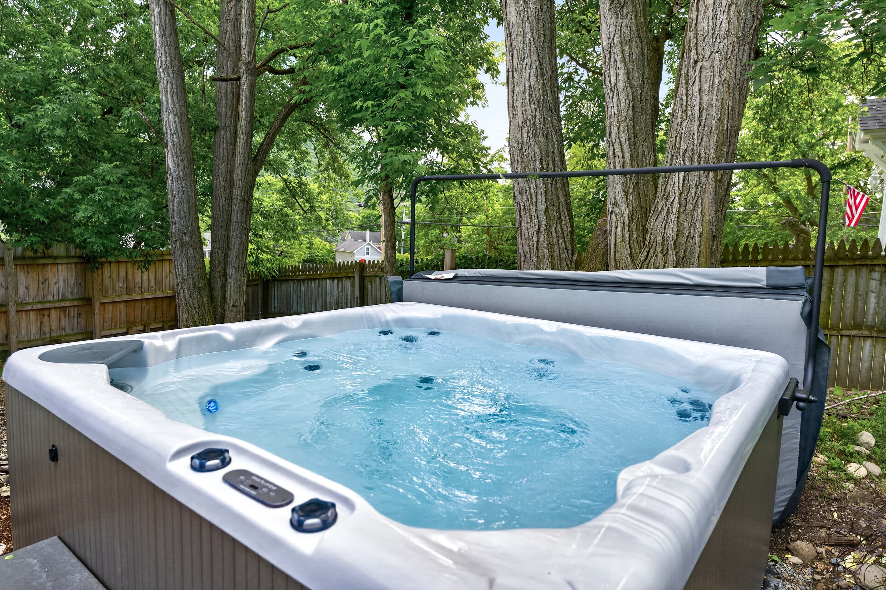 Hot tub beneath mature trees