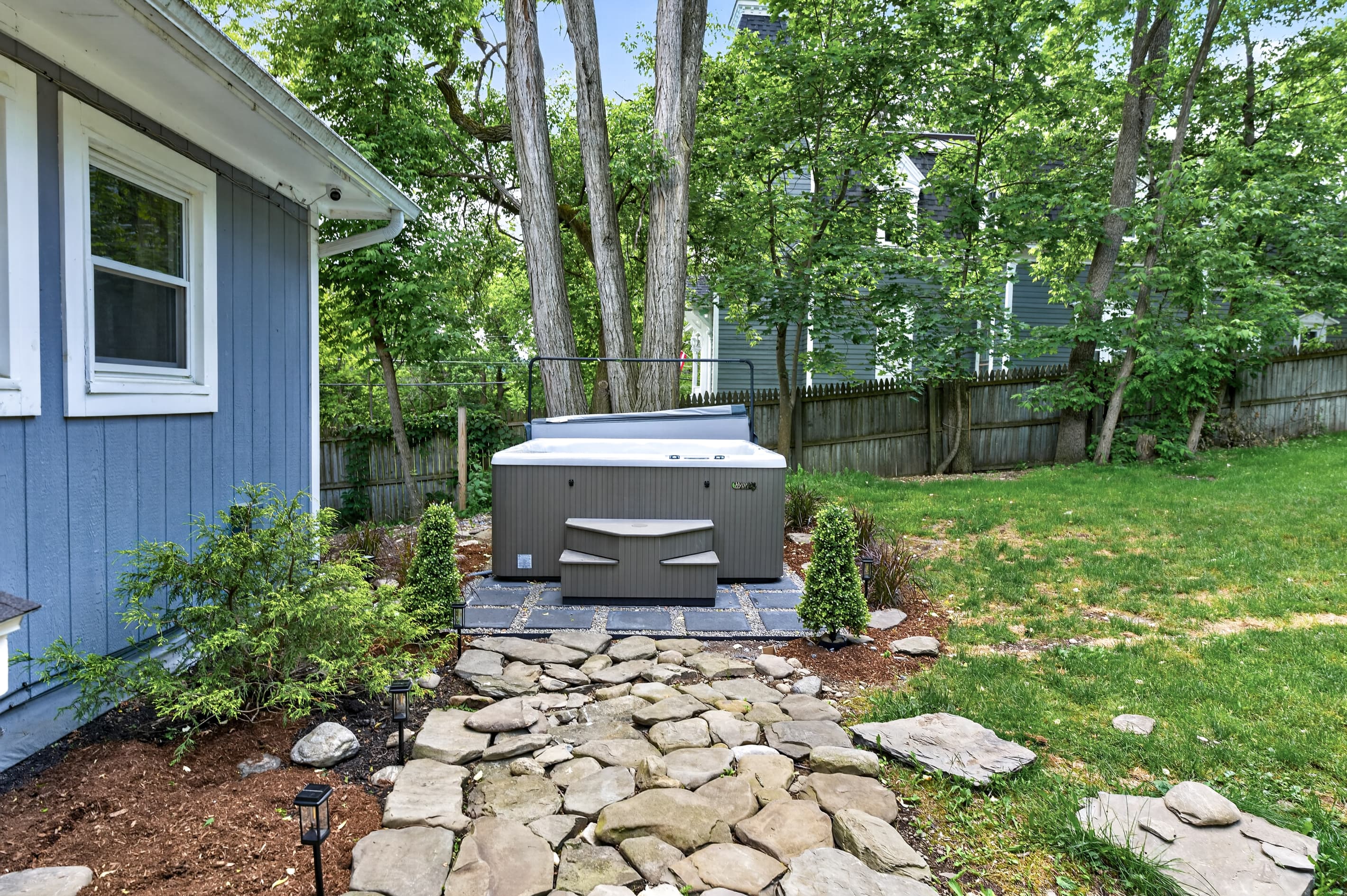 Stone walkway leading to the hot tub