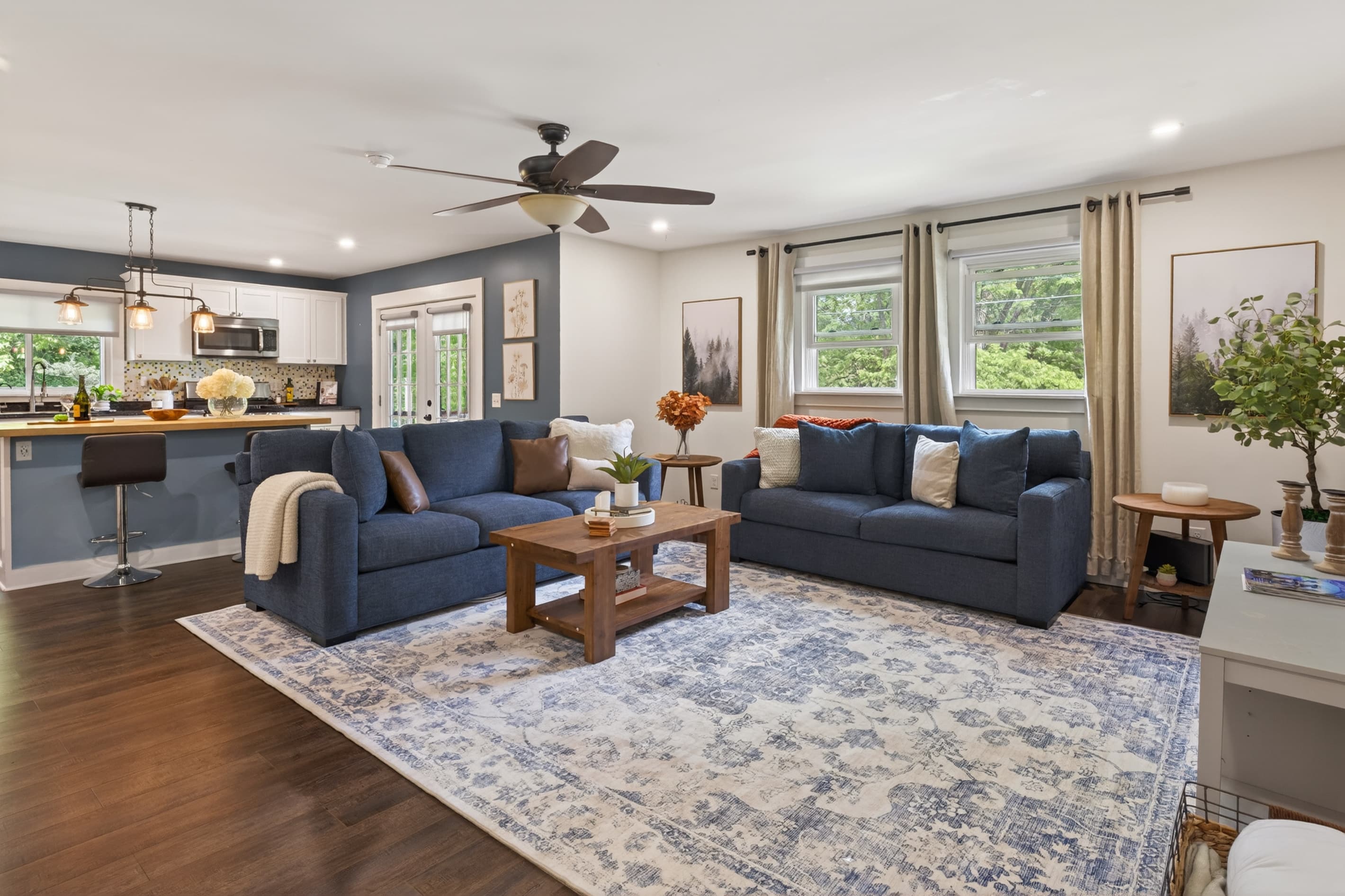 Open living room with kitchen beyond