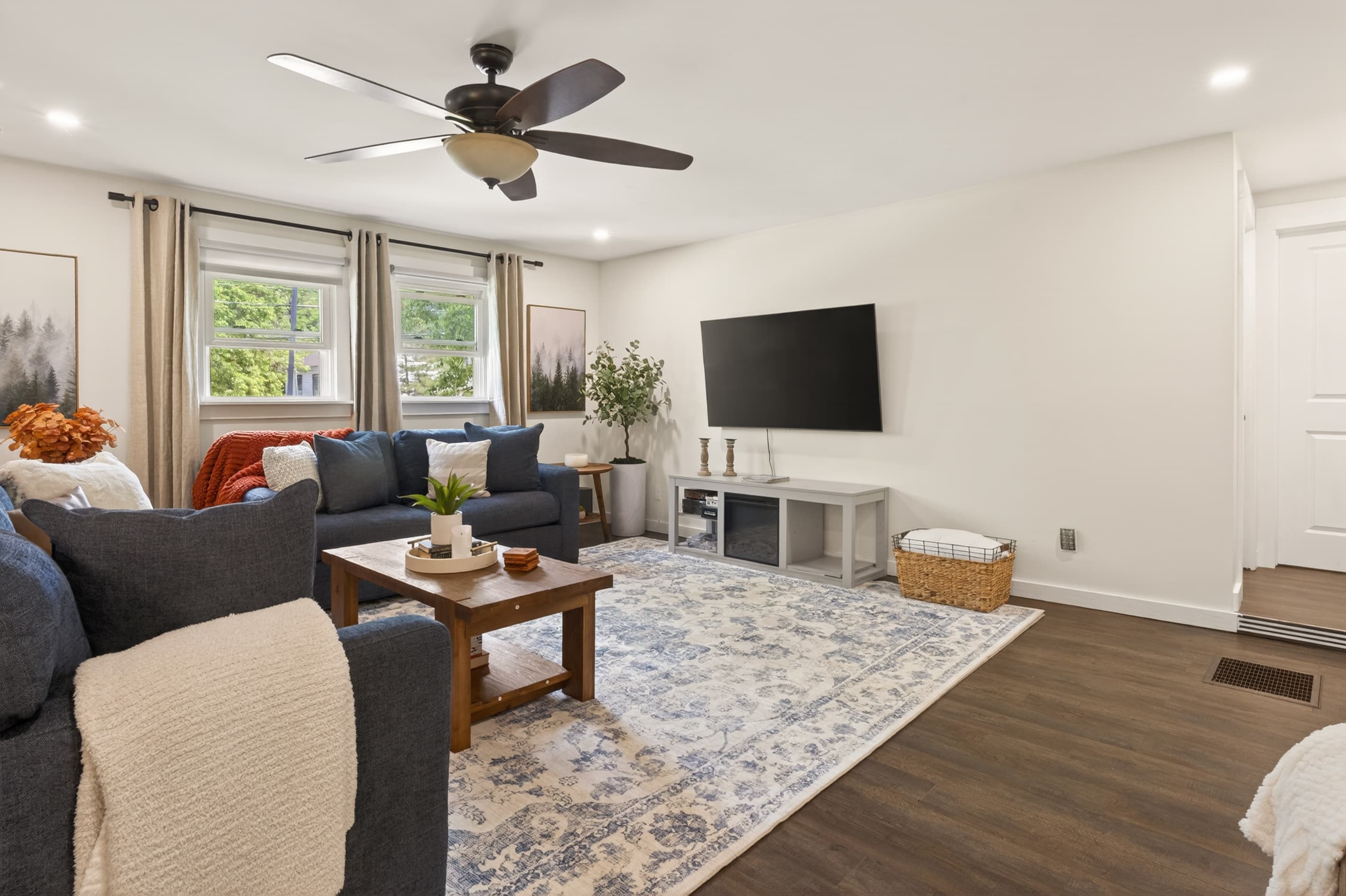 Living room with wall-mounted television