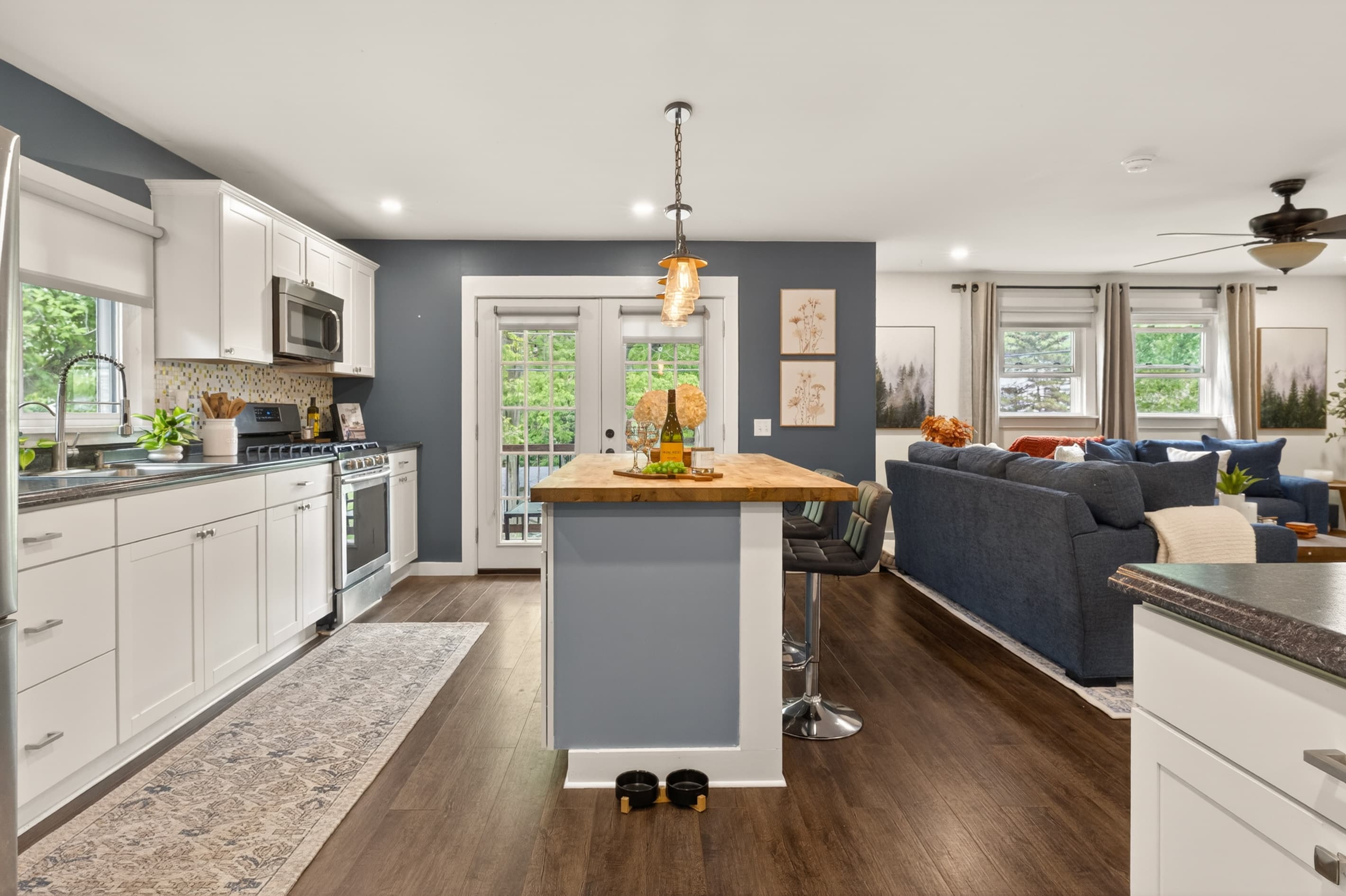 Kitchen island between cooking and living areas