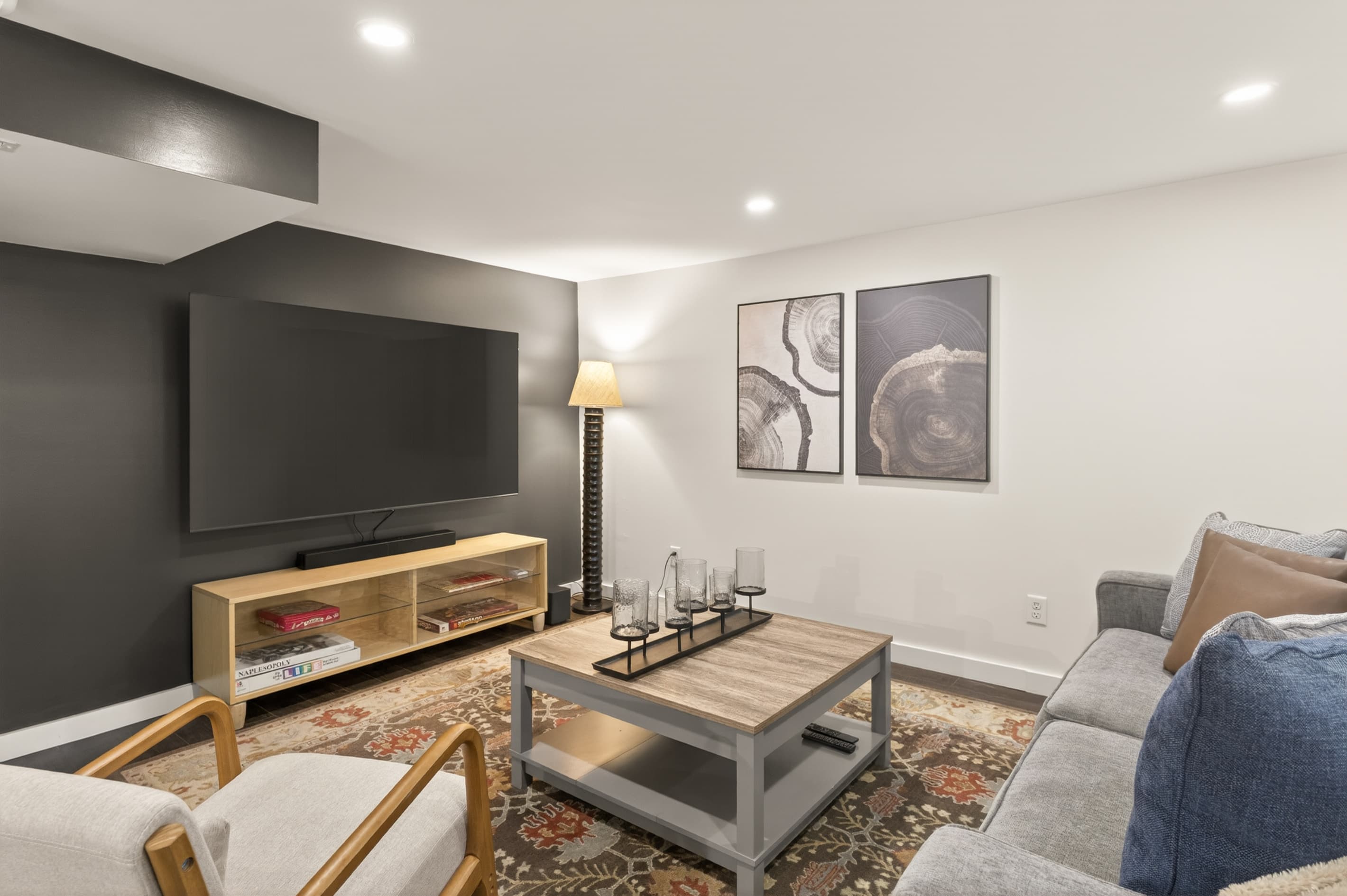 Television above wooden media console