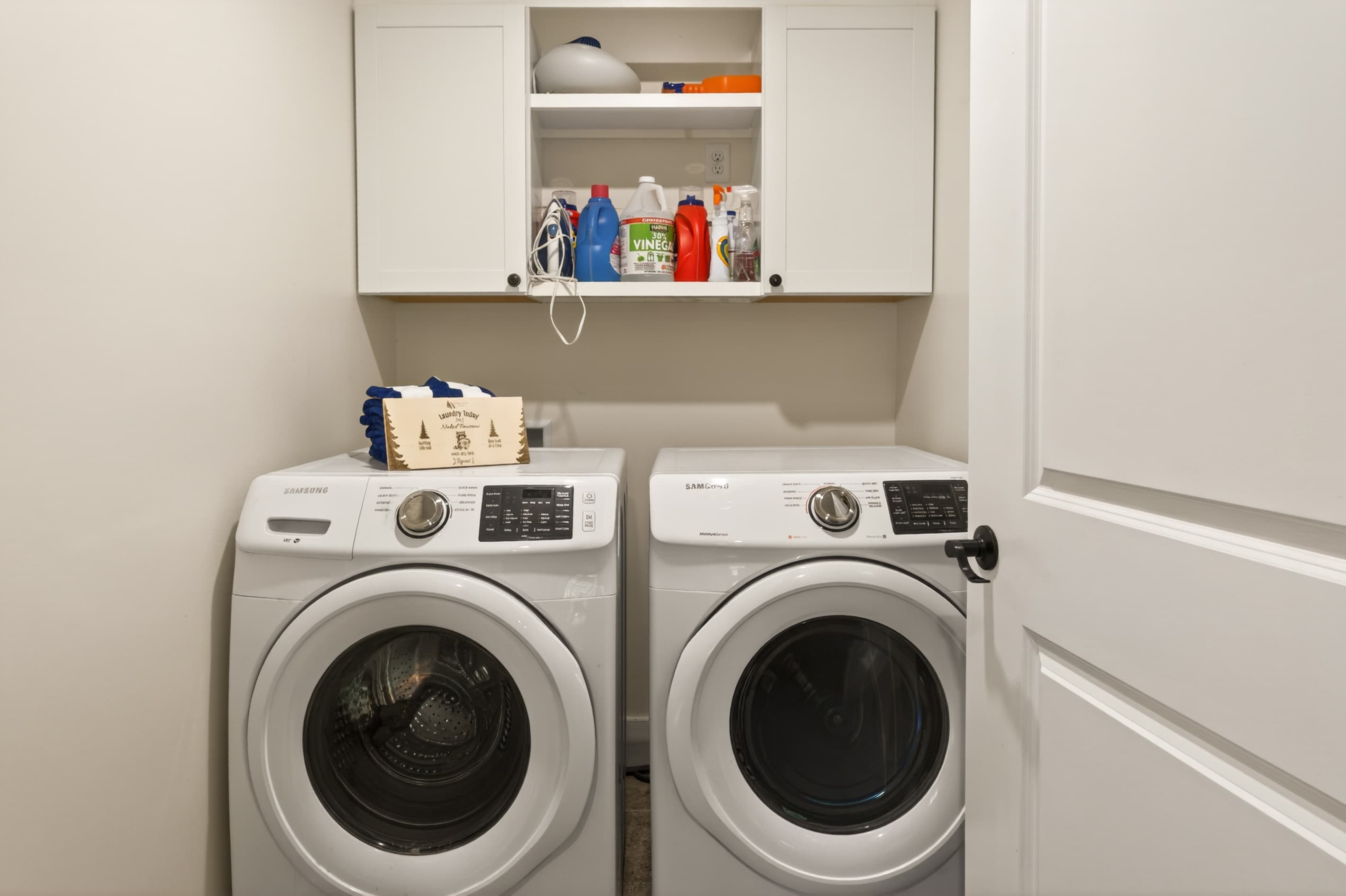 Laundry room with front-loading washer and dryer