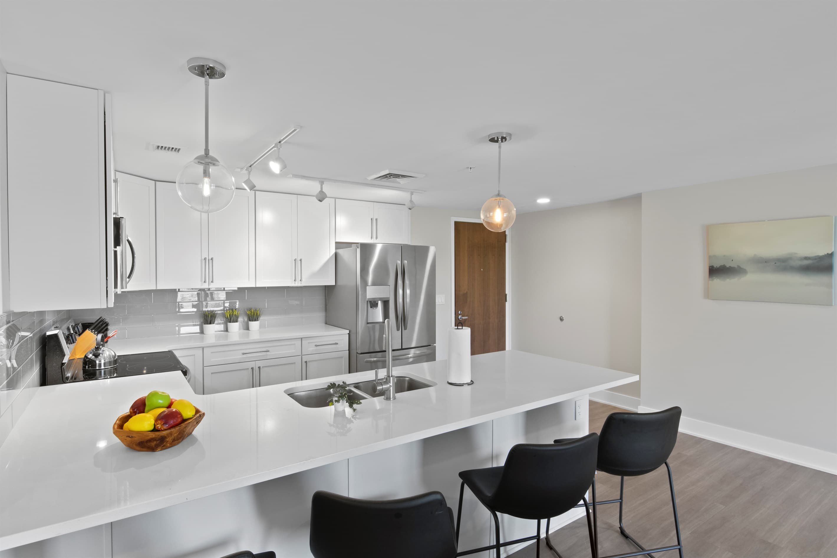 Kitchen bar with black seating