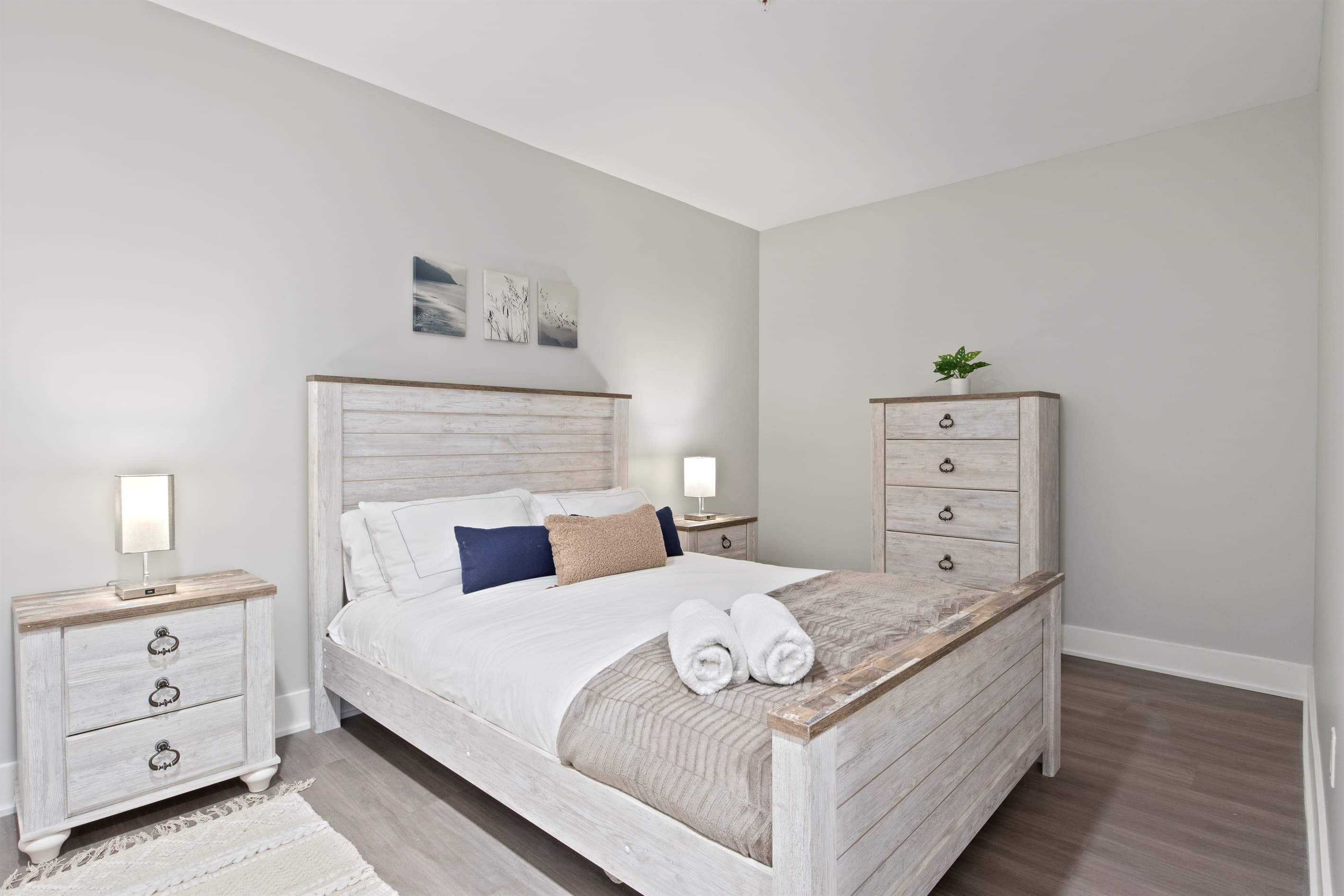Bedroom with light wood furnishings