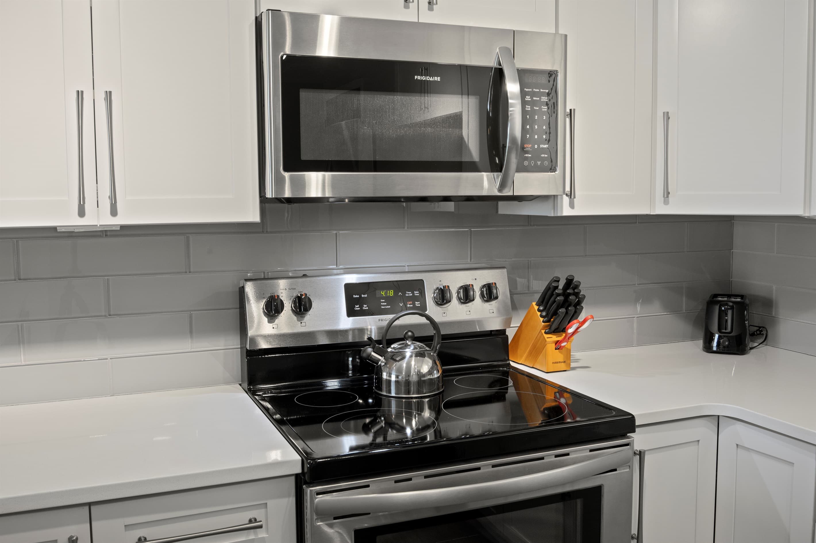 Stainless-steel range and built-in microwave
