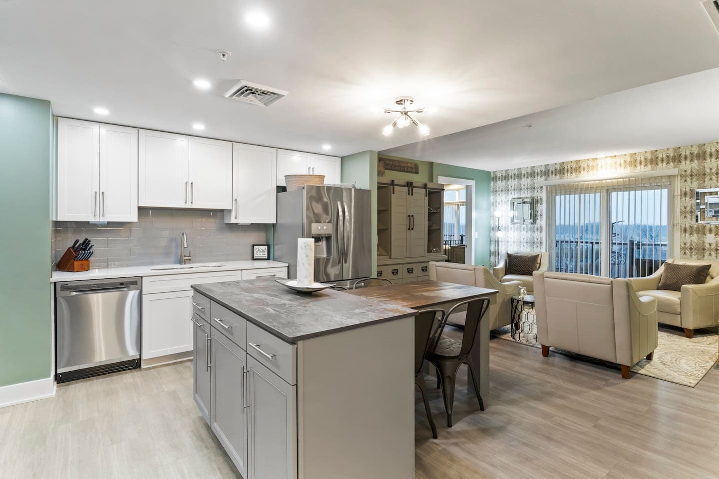 Open-concept kitchen, dining, and living area