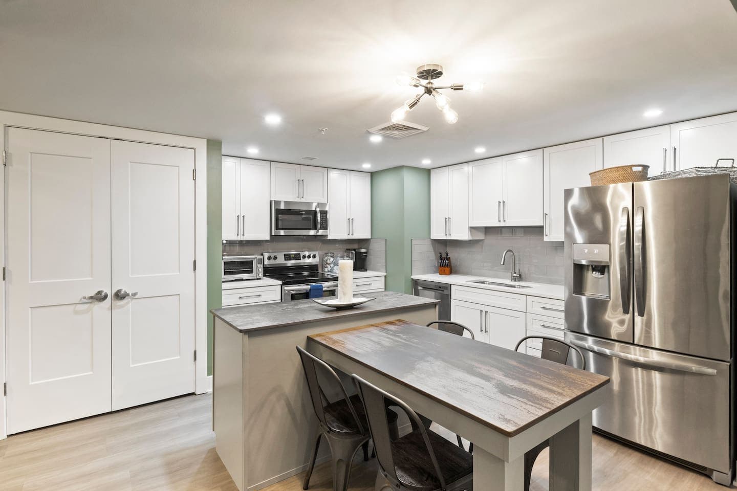 Kitchen island with adjacent dining area