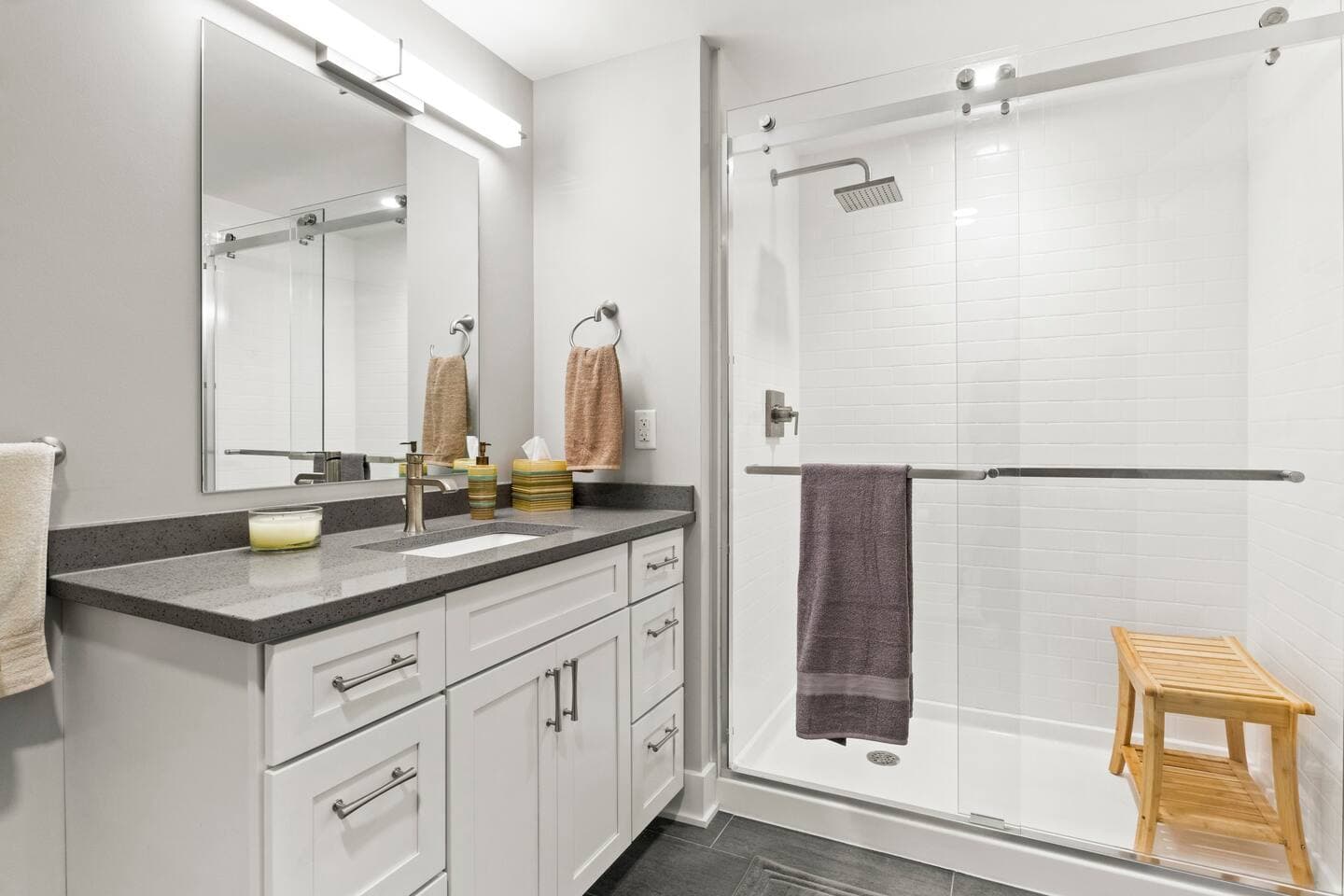 Bathroom with vanity and glass shower