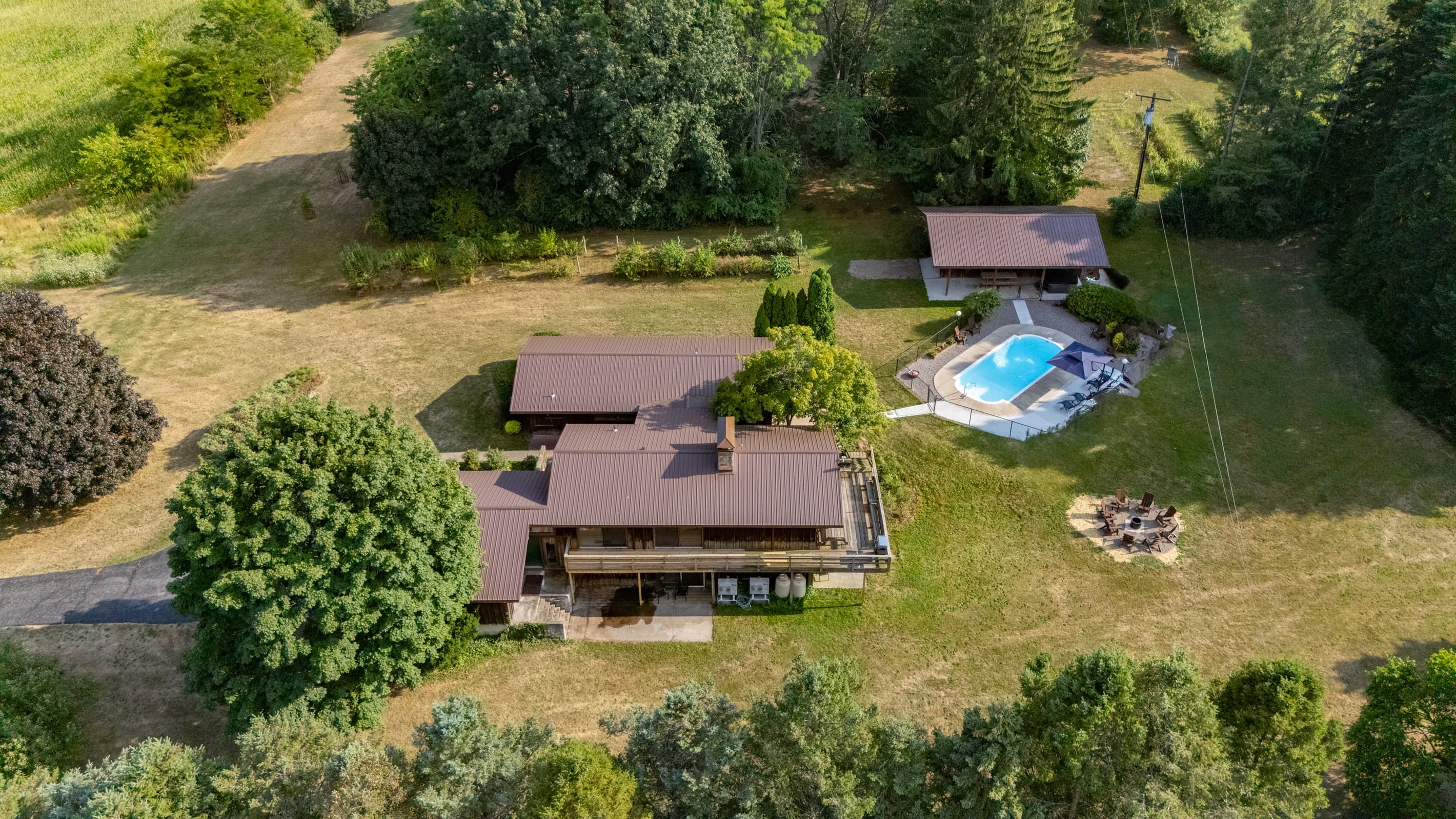 Aerial view of the home and grounds