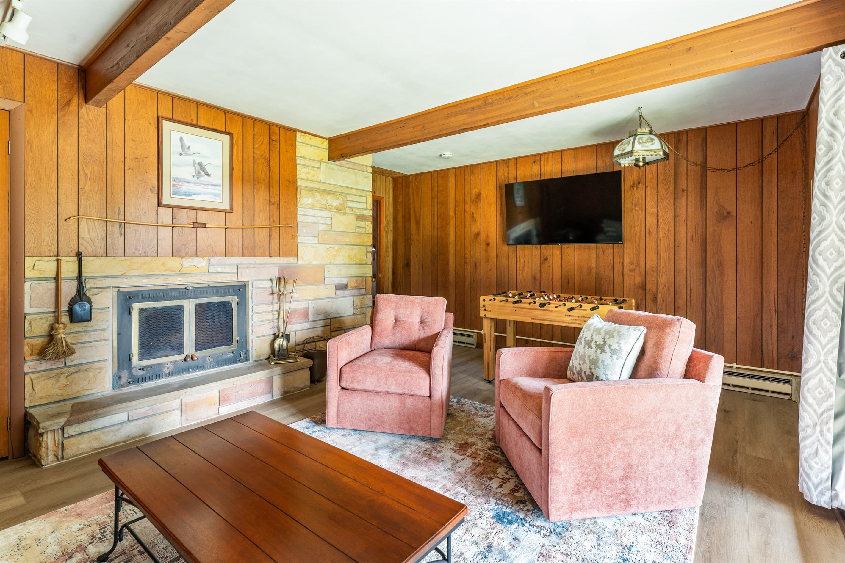 Living room with wall-mounted television