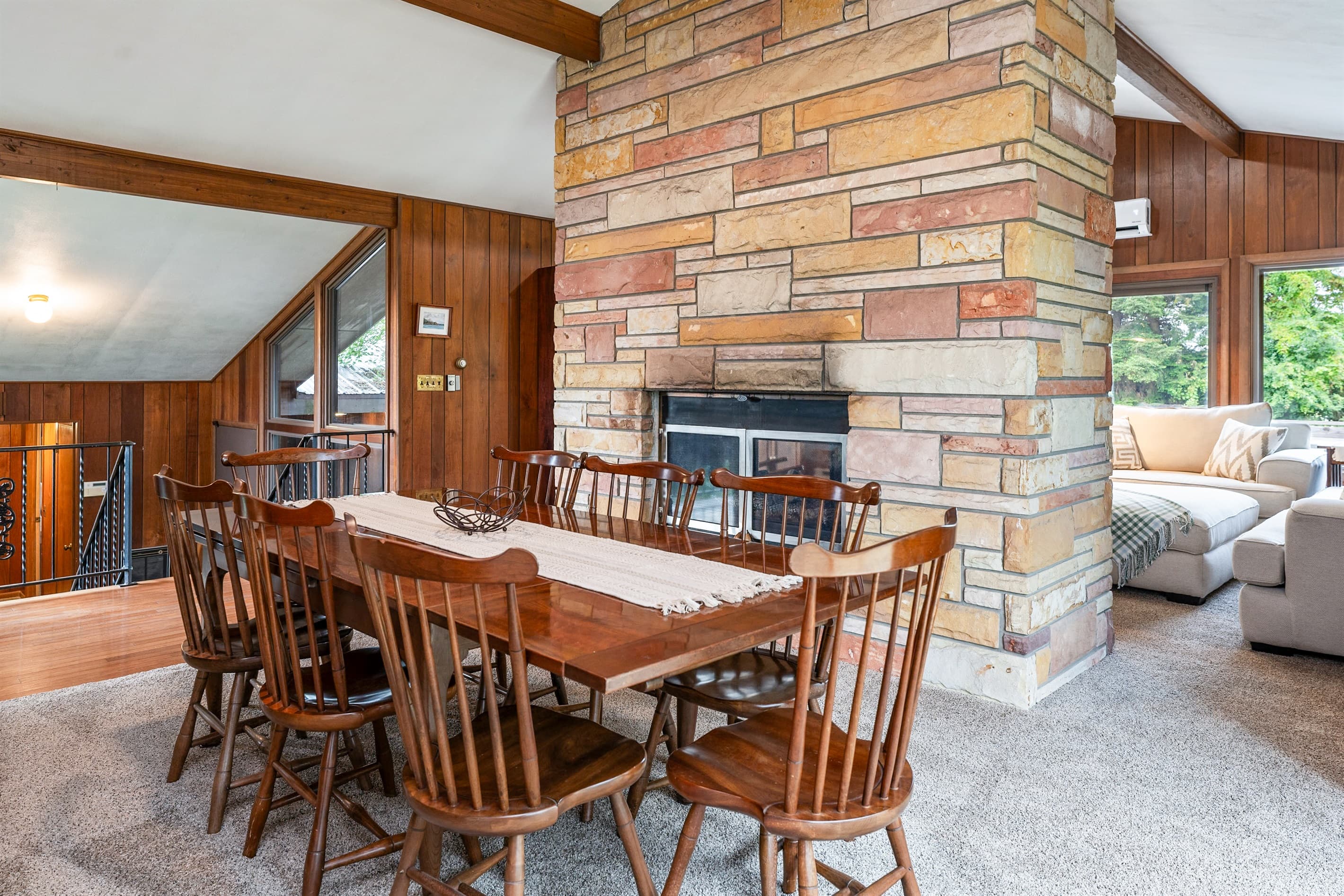 Open dining area connecting both living spaces