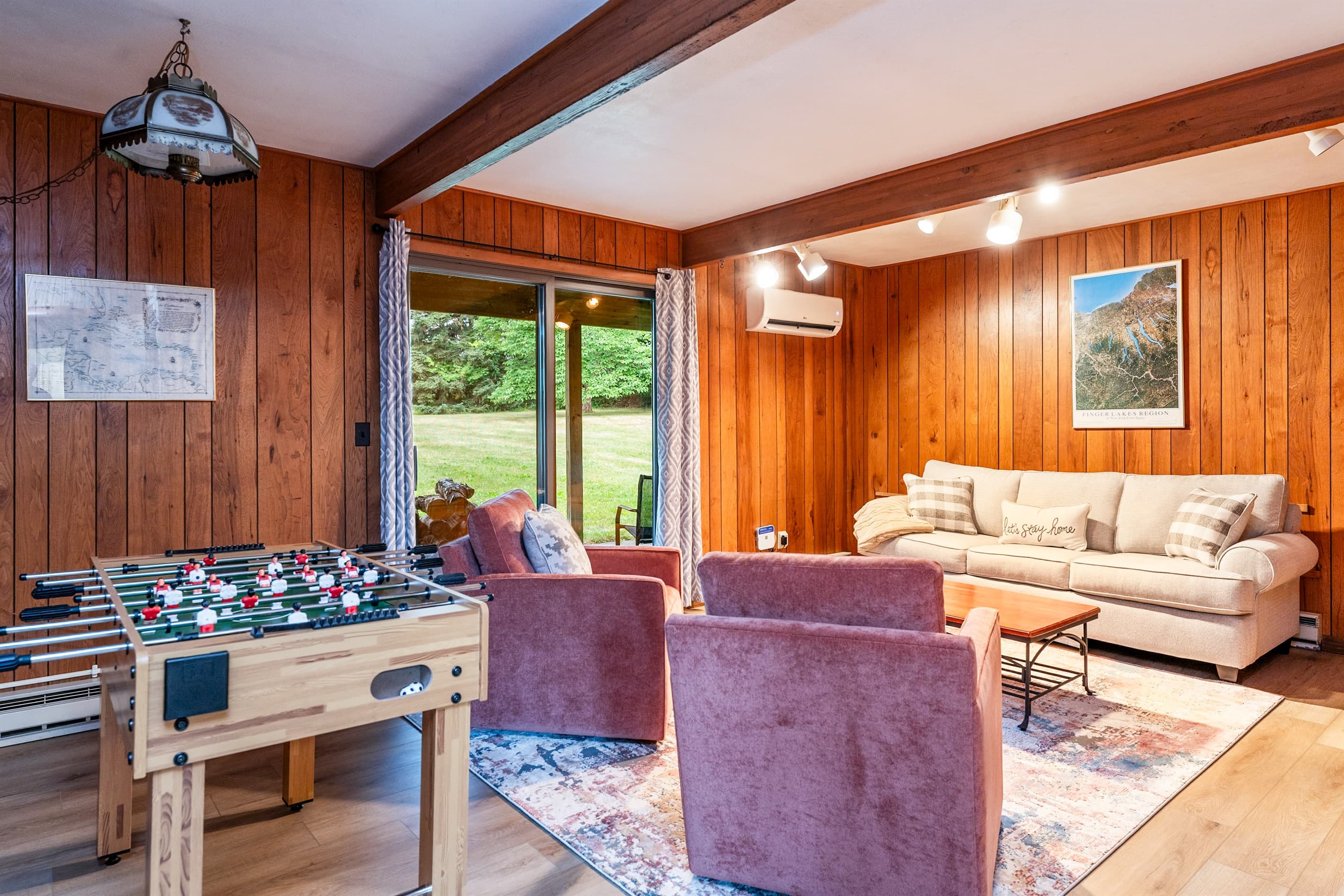 Family room with foosball and sleeper sofa