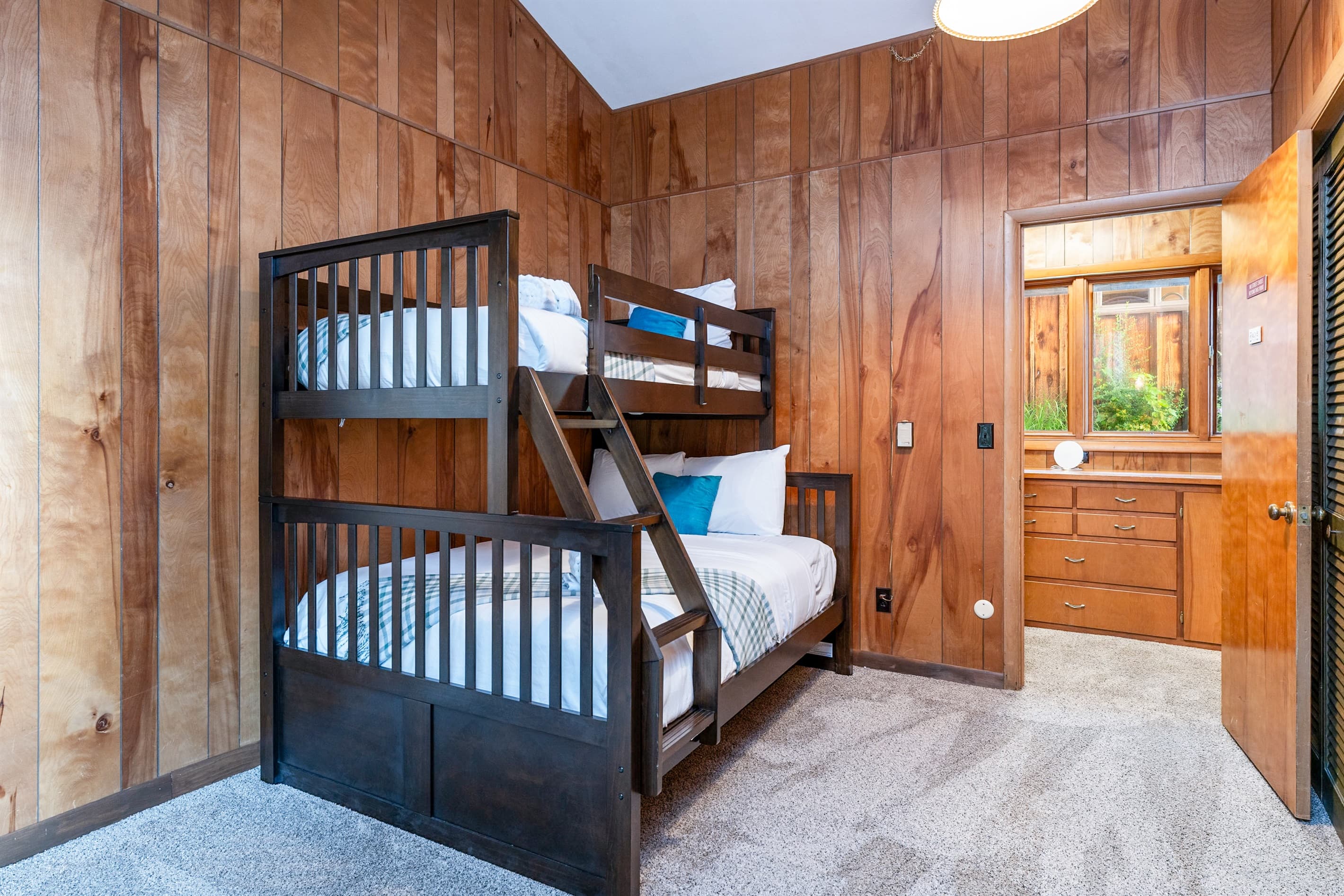 Bunk room with two wooden bunk beds
