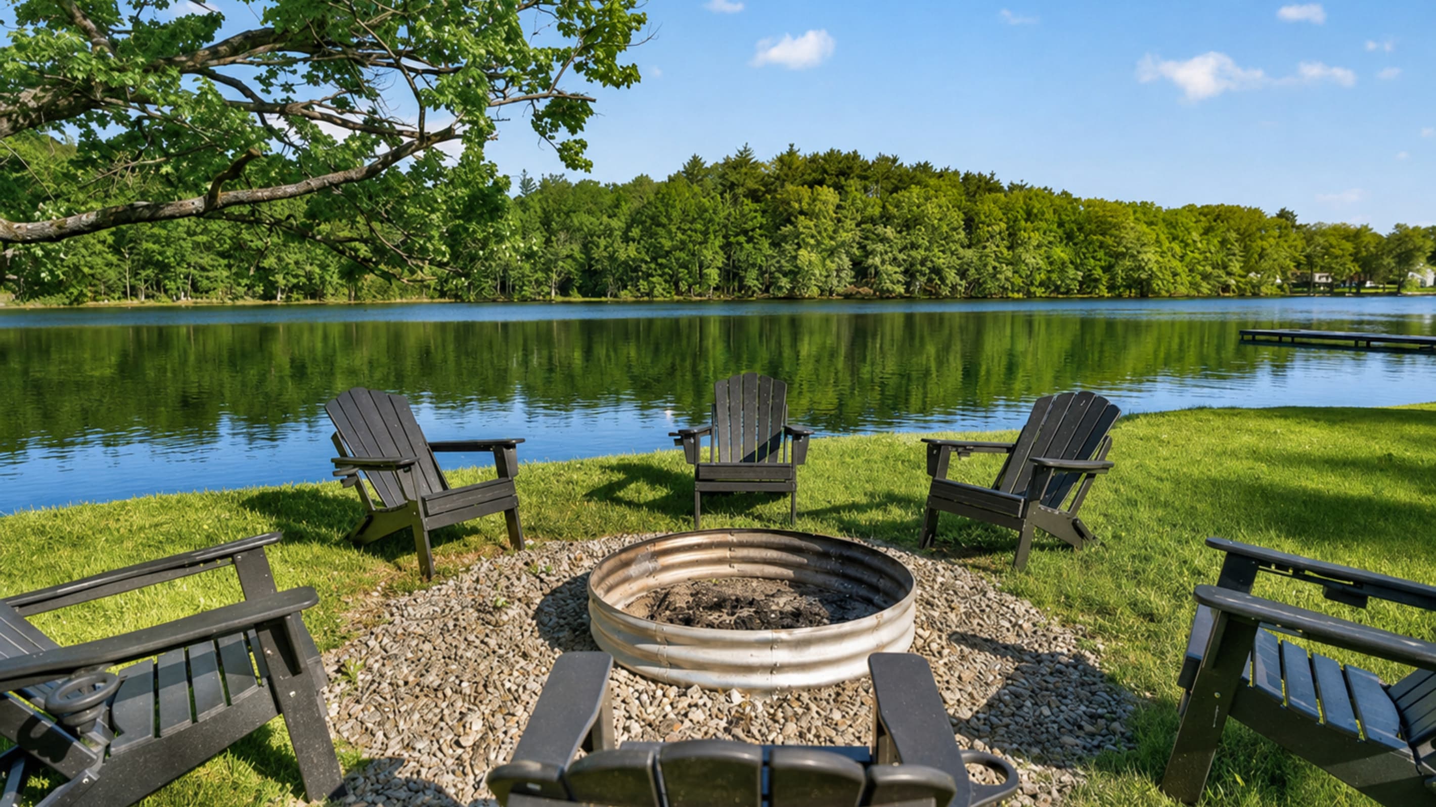 Lakeside fire pit with Adirondack chairs