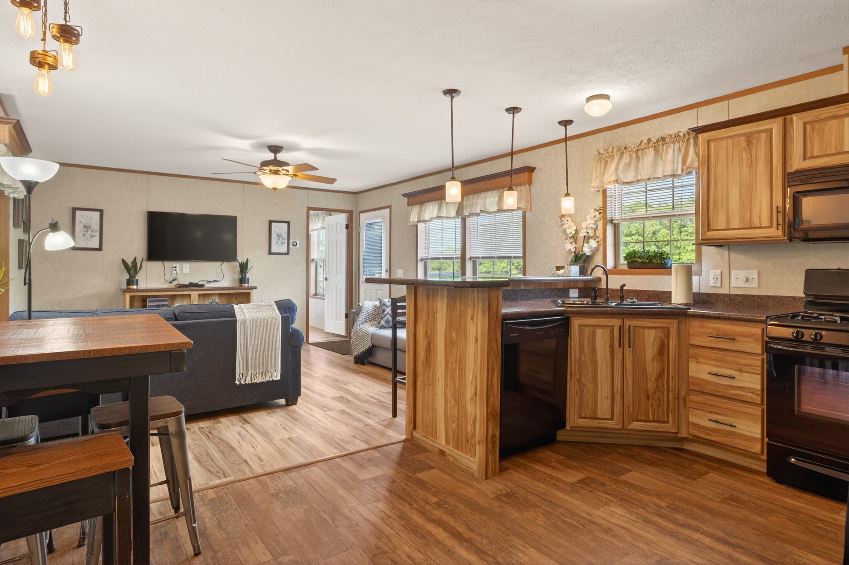 Cabin #3 kitchen with wooden cabinetry