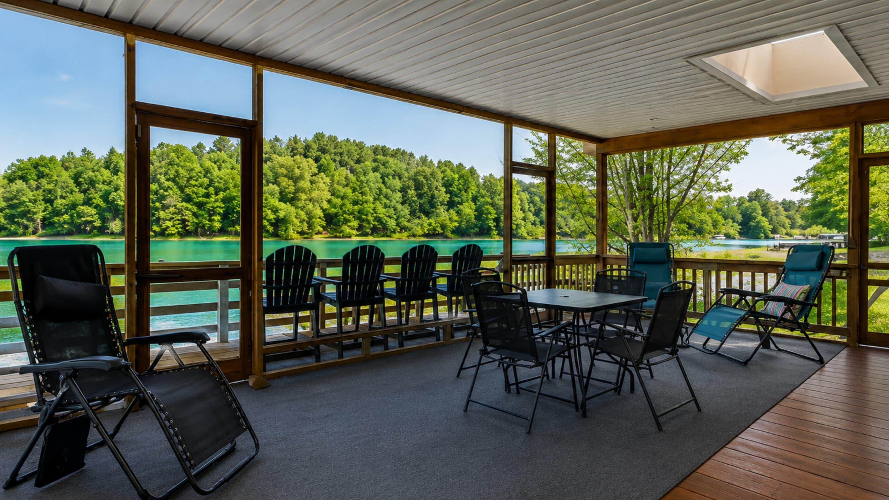 Screened pavilion with long dining table
