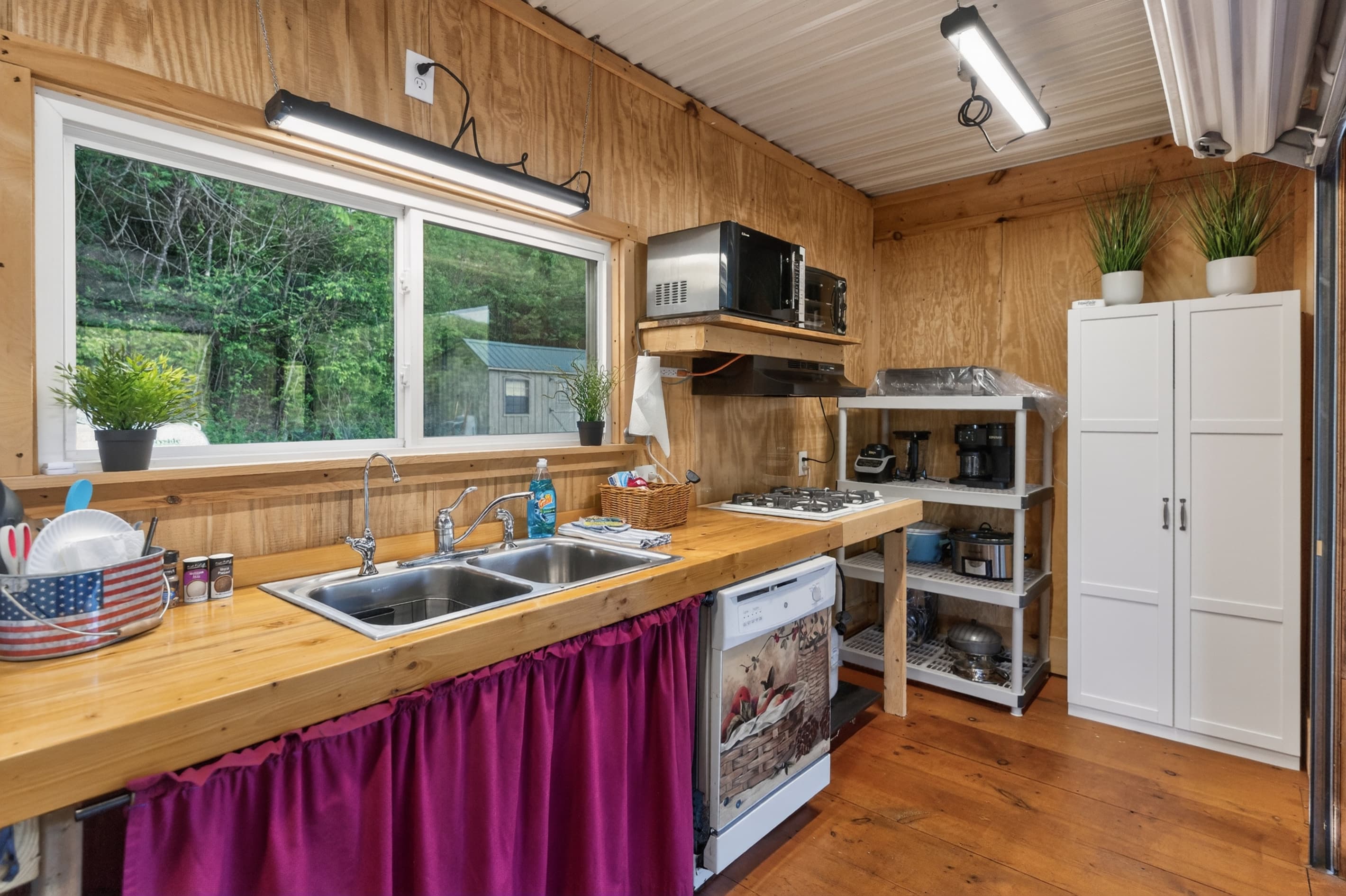 Pavilion kitchen with refrigerator and range