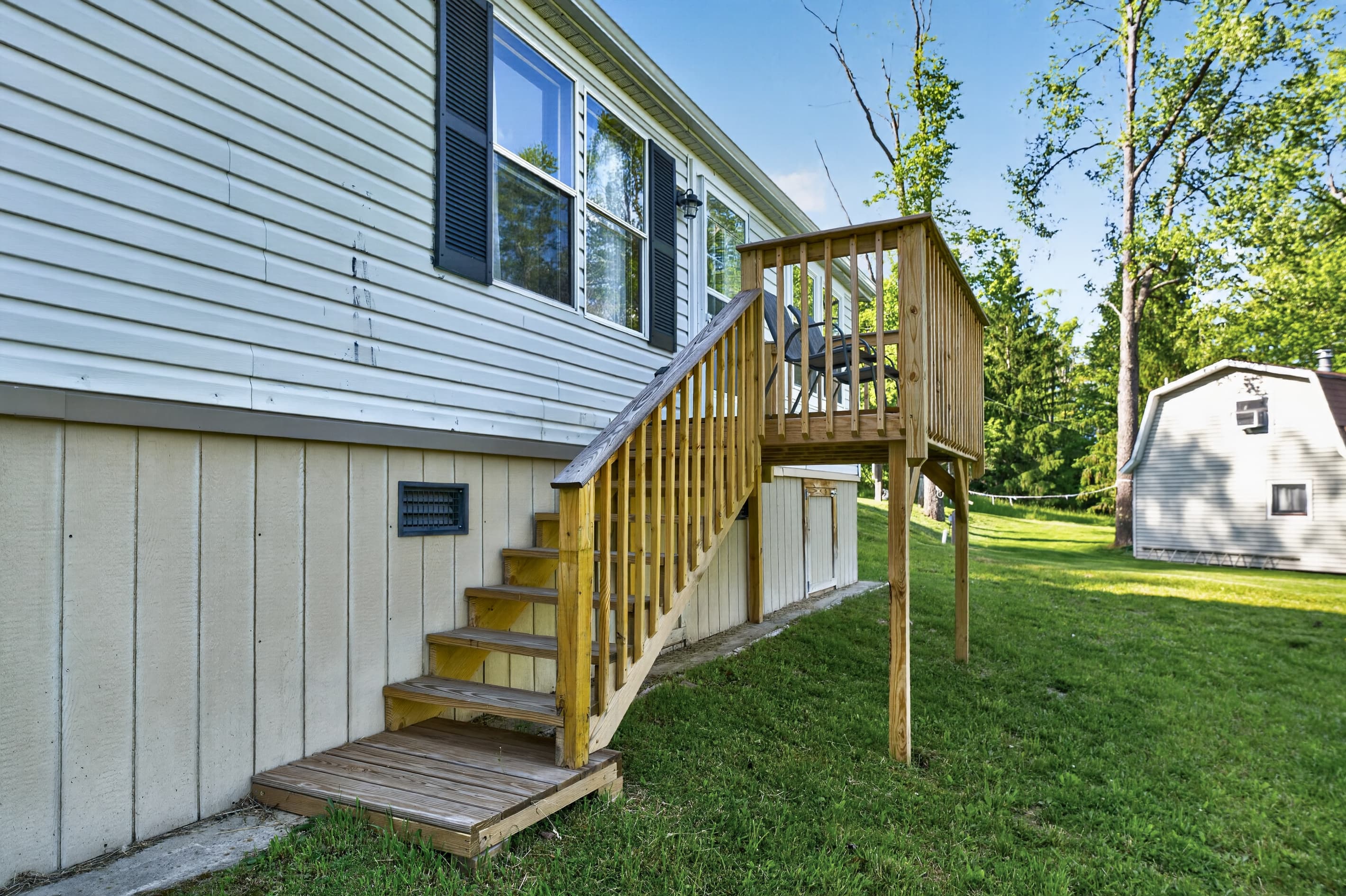 Cabin #1 side entrance with wooden steps