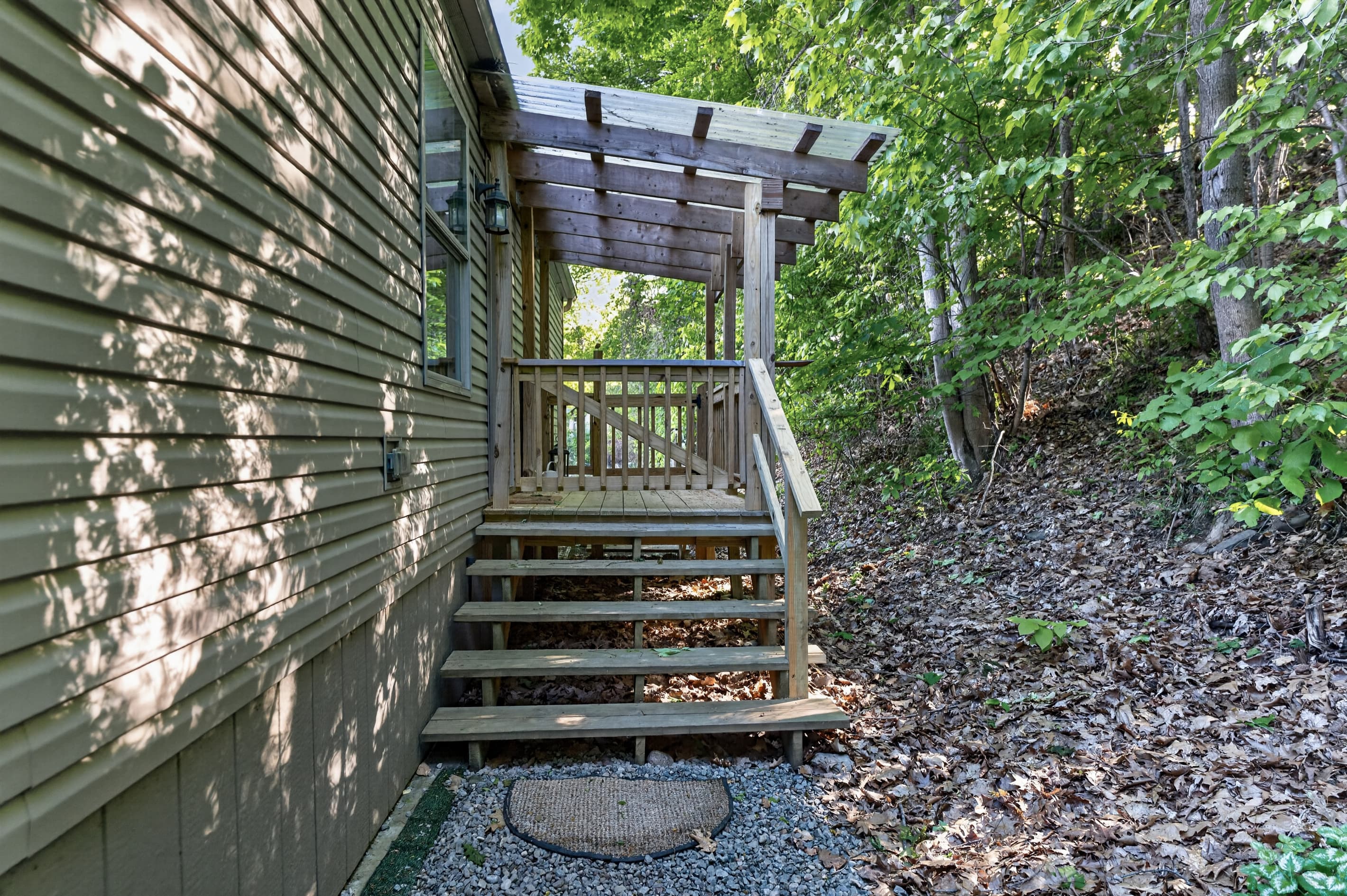 Cabin #3 exterior staircase beside the deck