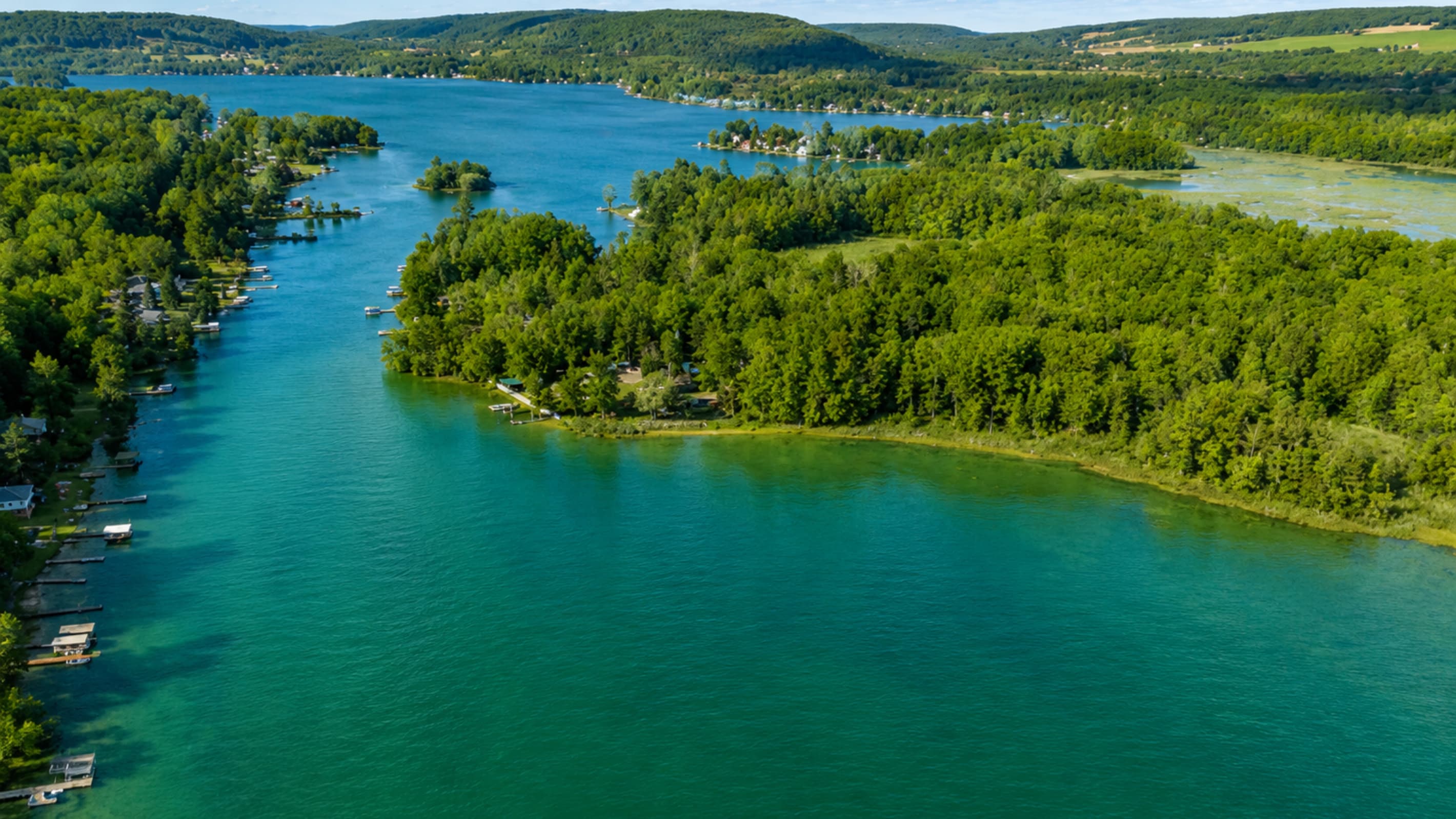 Tree-covered peninsula extending into the lake