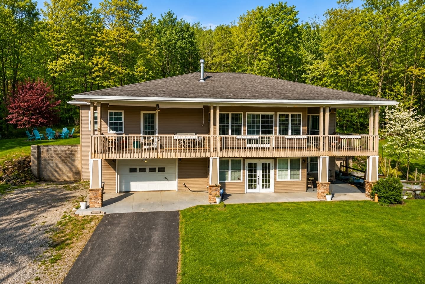 Home exterior with covered porch and sunroom