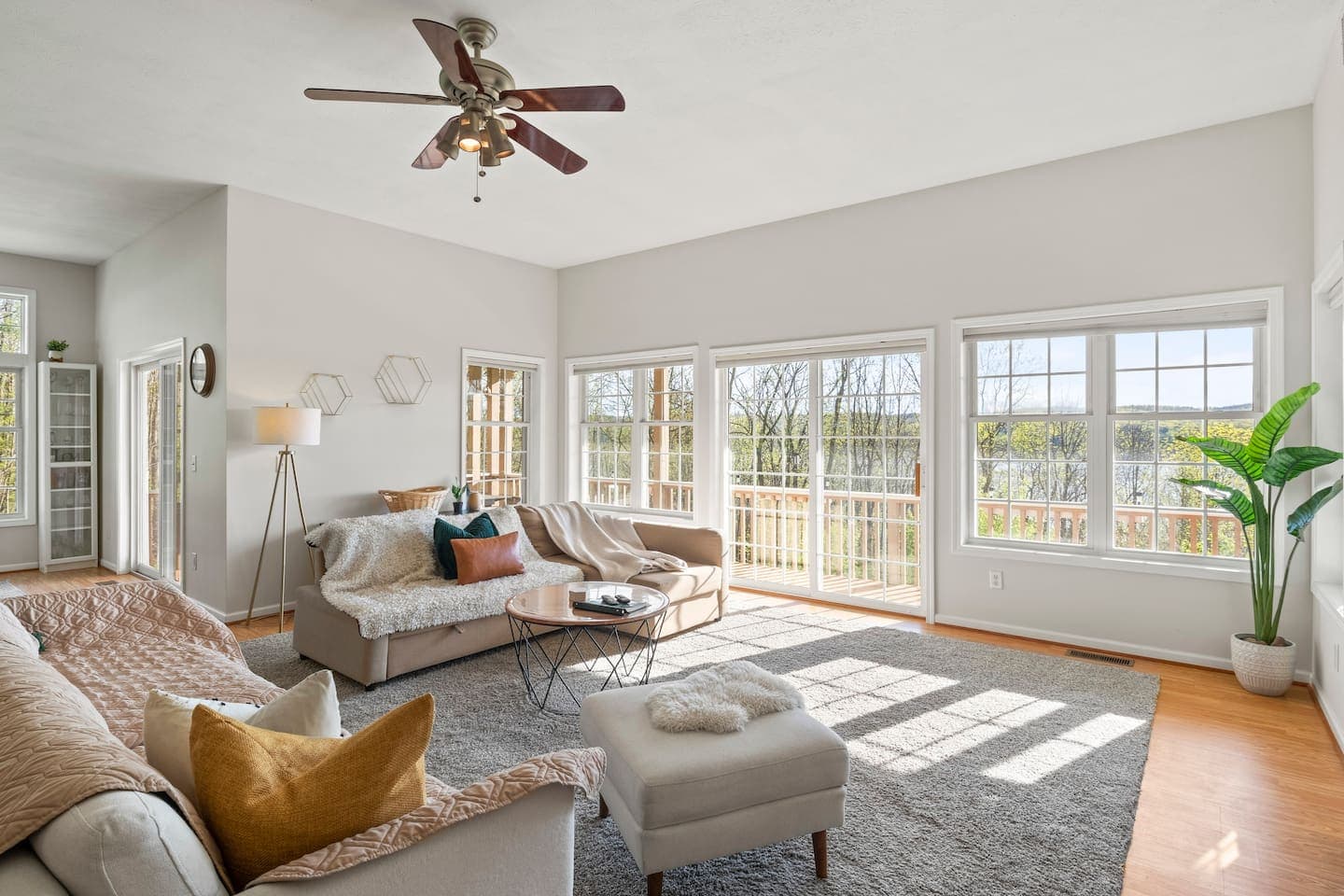 Sunlit living room with sectional sofa