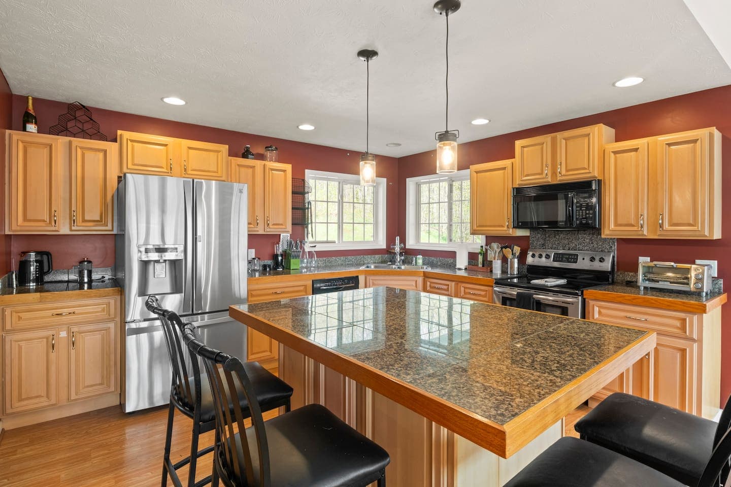 Kitchen with wood cabinetry and stainless appliances