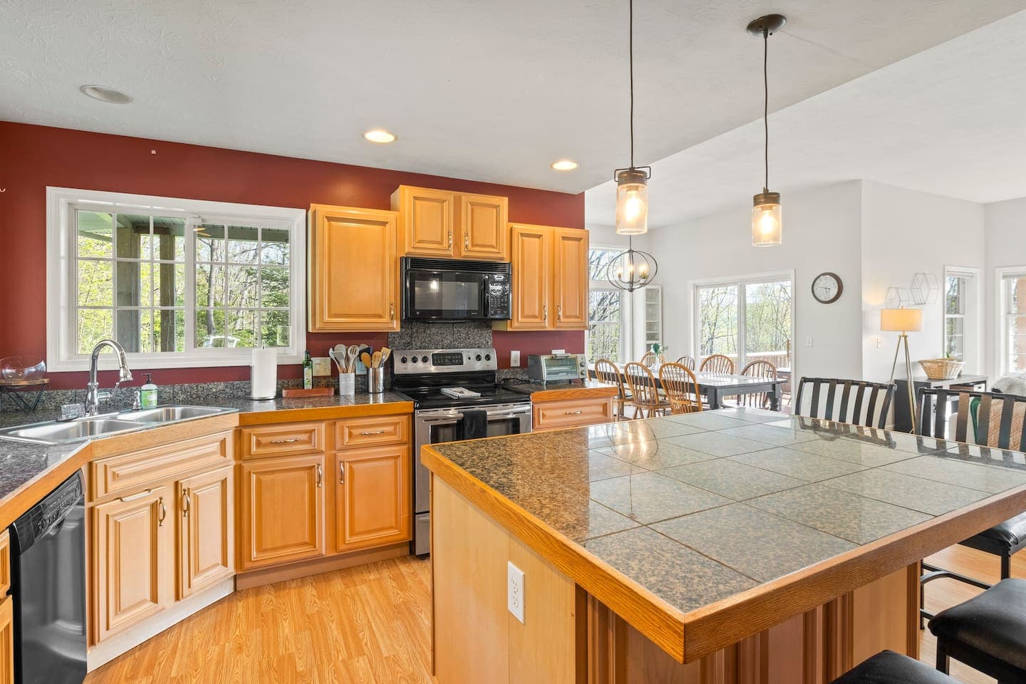Open kitchen with breakfast bar seating