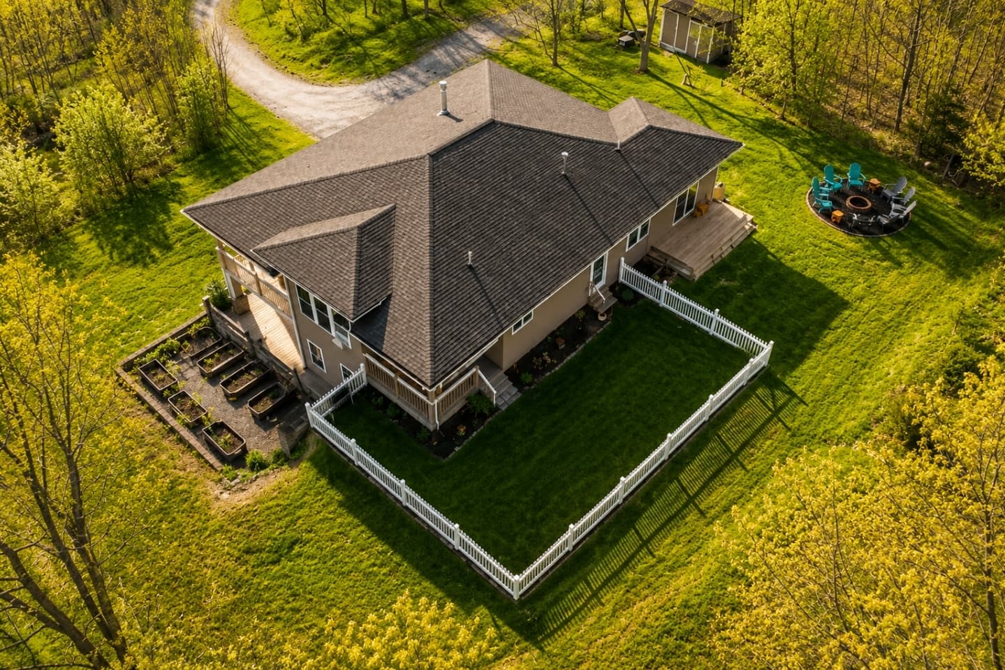 Aerial view of the home and surrounding yard