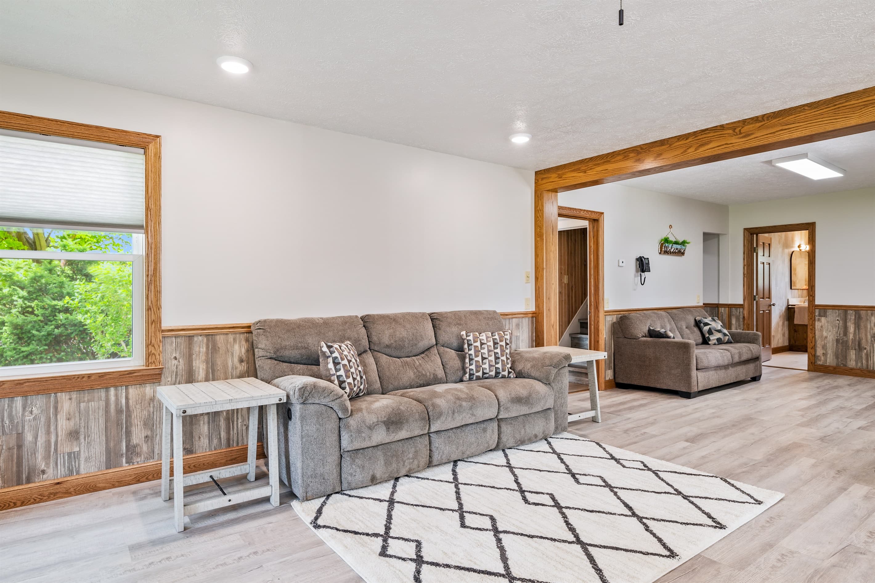 Sitting area with sectional and large window