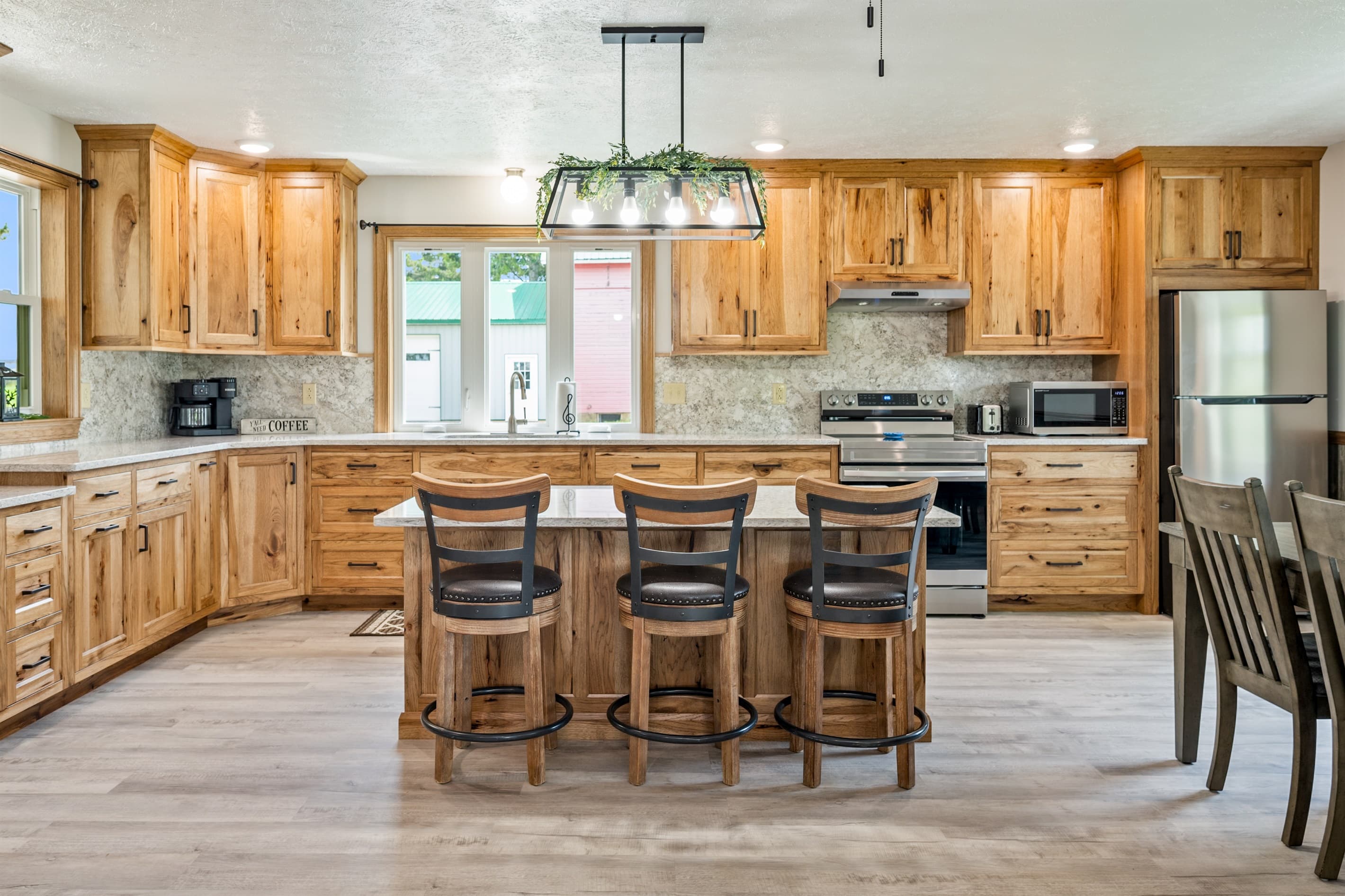 Kitchen island with four counter stools