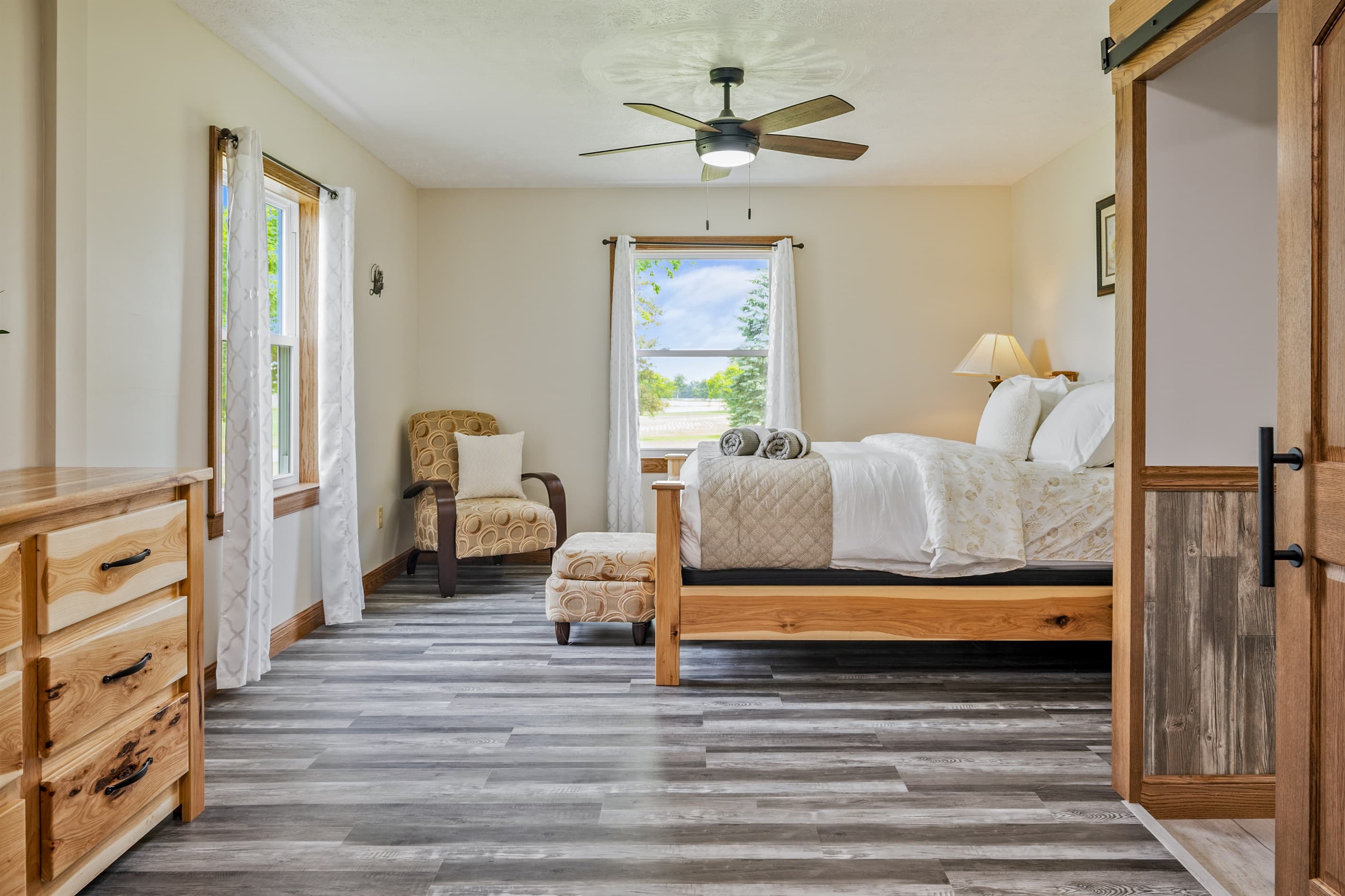 Bedroom with two wooden-framed beds