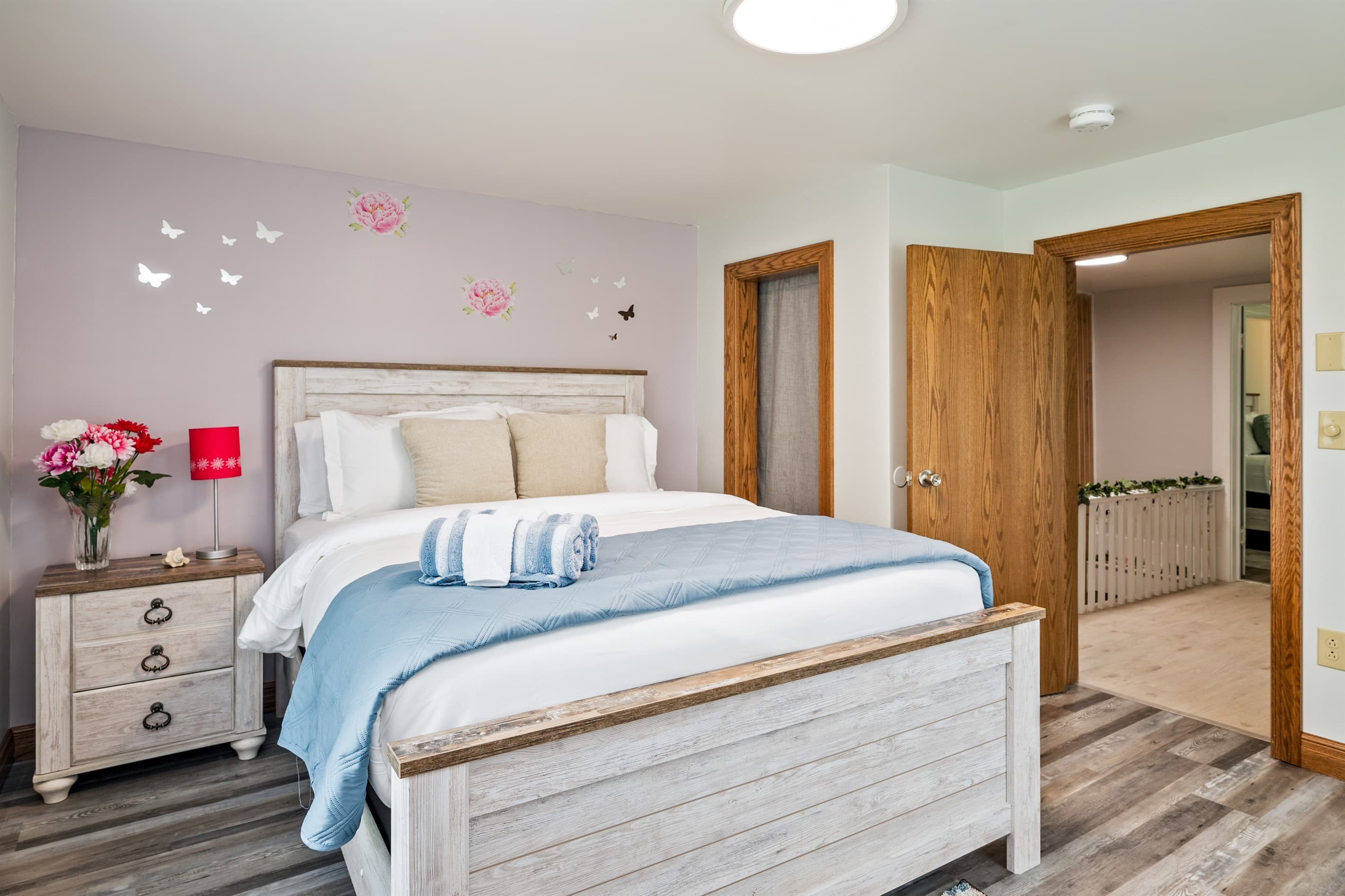 Large bedroom with bed and desk