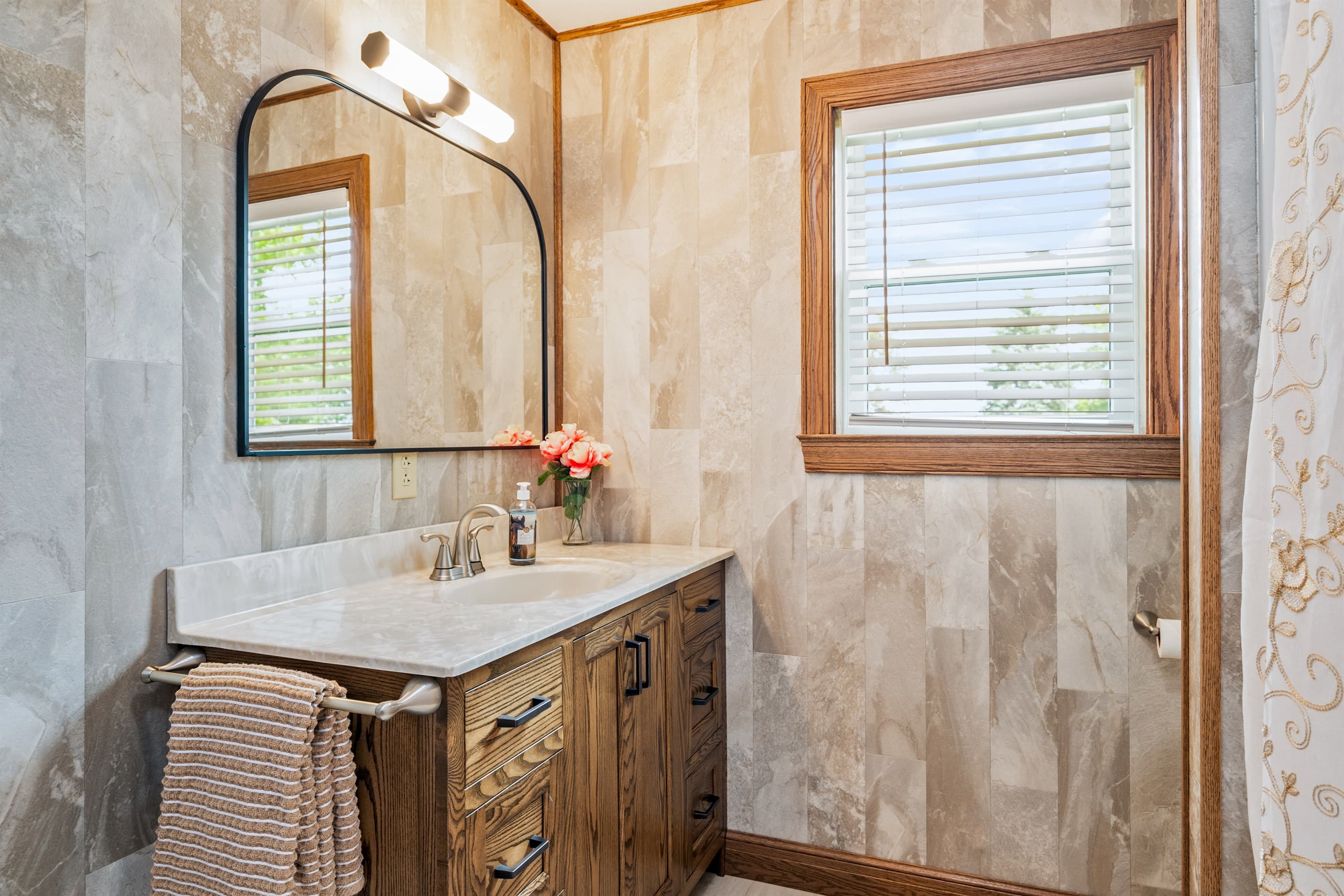 Bathroom vanity beside the shower
