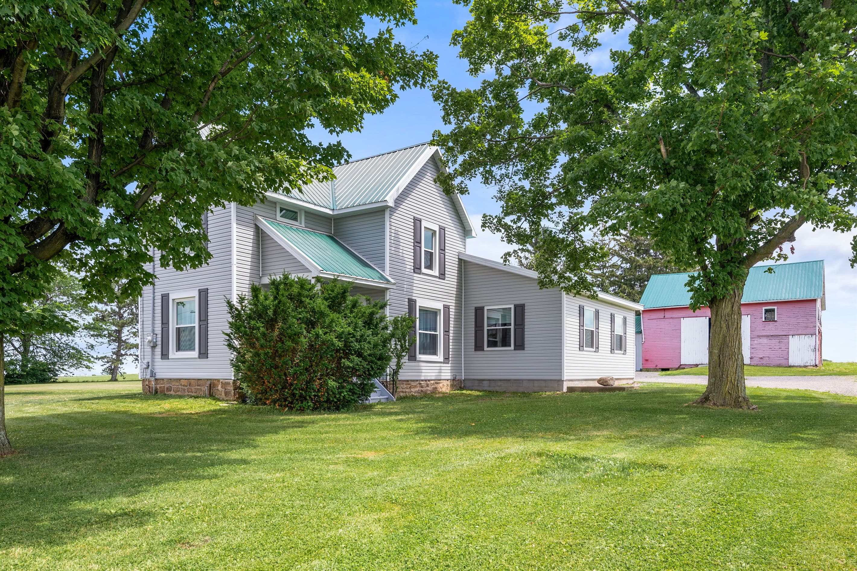 Front view of the two-story farmhouse