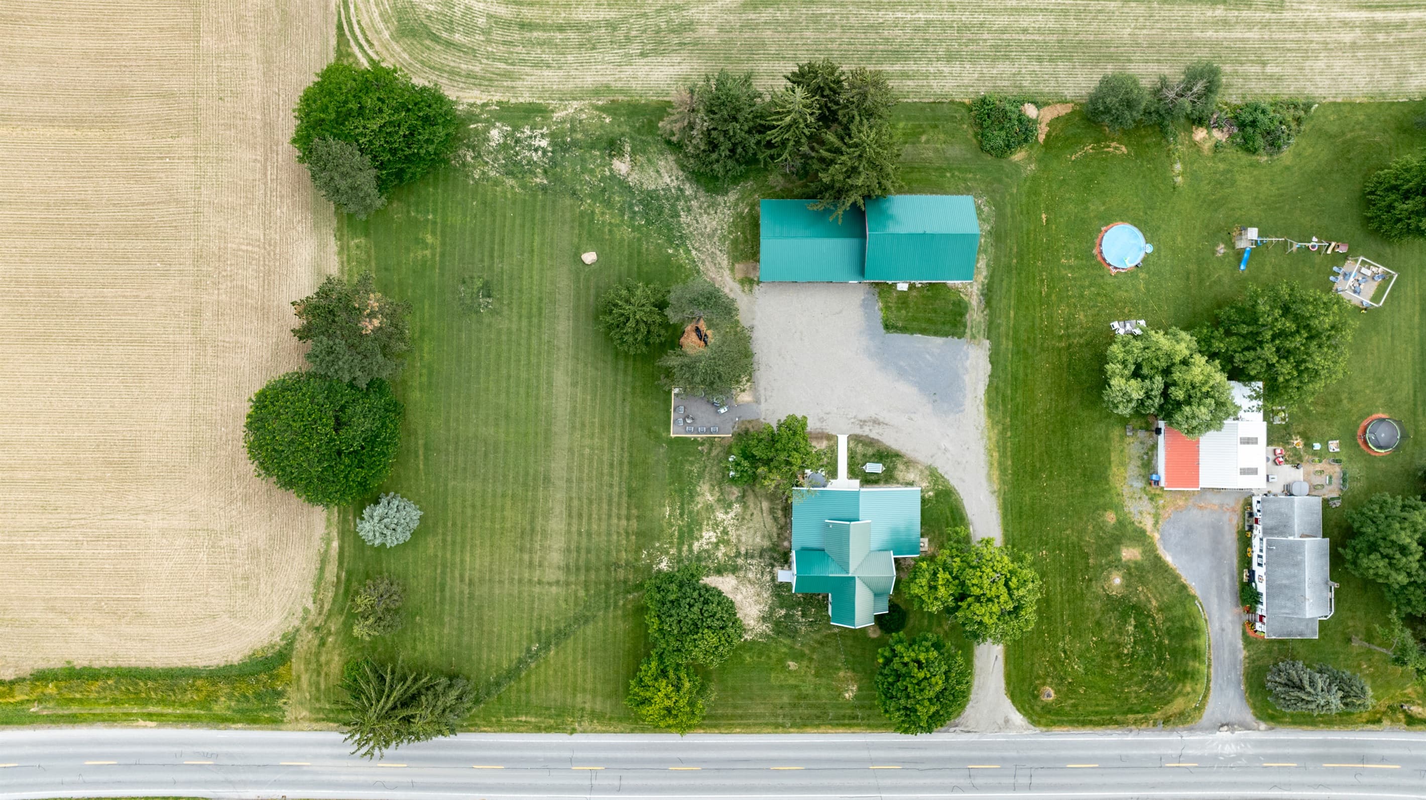 Overhead view of the property and its driveway